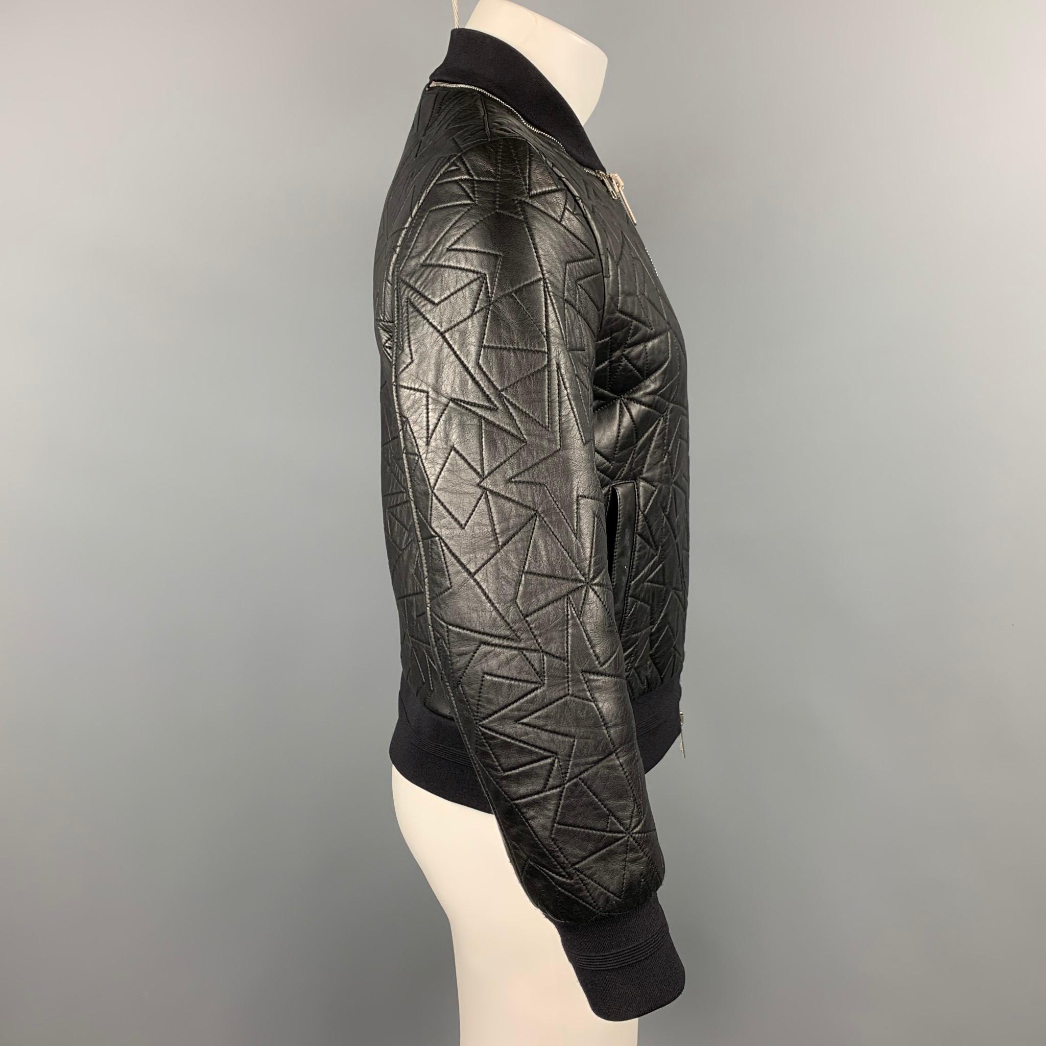 NEIL BARRETT jacket comes in a black quilted leather with a full liner featuring a bomber style, skinny fit, zipper details, slit pockets, and a full zip up closure. Made in Italy.

Excellent Pre-Owned Condition.
Marked: S

Measurements:

Shoulder: