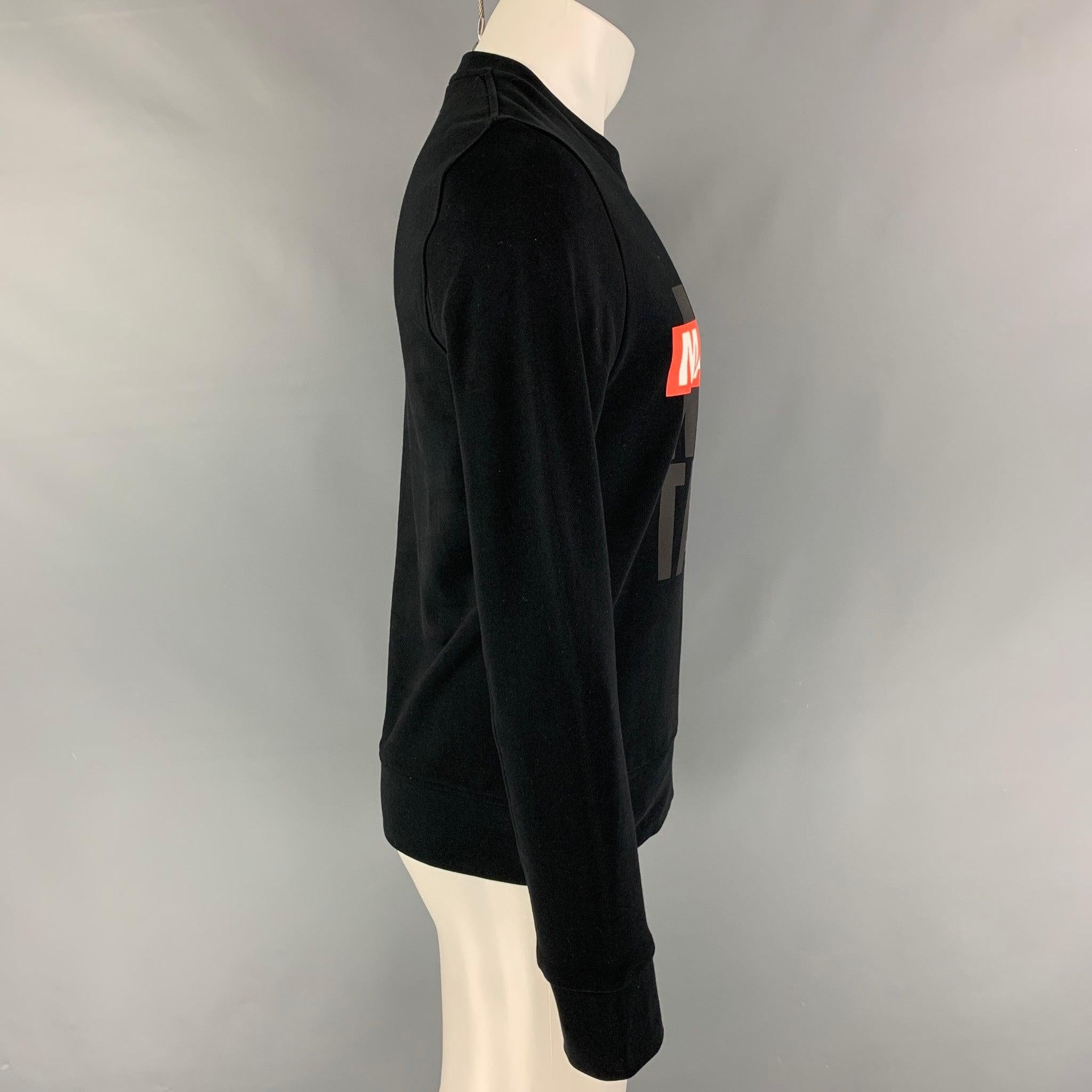 NEIL BARRETT sweatshirt comes in a red & black viscose featuring a 'Man-tastic' graphic and a crew-neck. Made in Portugal.
New With Tags.
 

Marked:   S 

Measurements: 
 
Shoulder: 16.5 inches  Chest: 39 inches  Sleeve:
27.5 inches  Length: 26.5