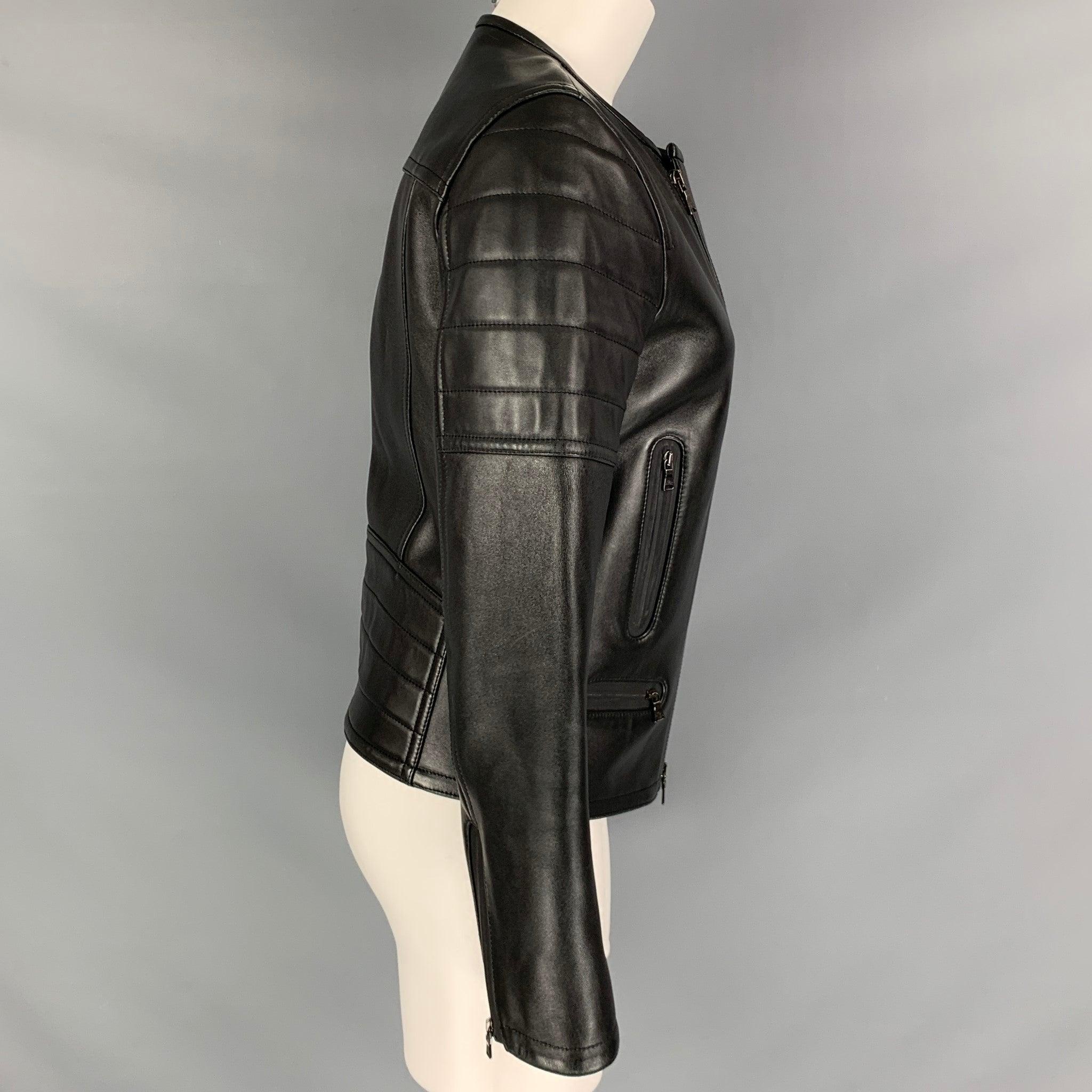 NEIL BARRETT jacket comes in a black leather featuring a motorcycle style, boyfriend fit, padded panels, and a zip up closure. Made in Italy.Very Good Pre- Owned Condition. 

Marked:   S 

Measurements: 
 
Shoulder: 15.5 inches Bust: 35 inches