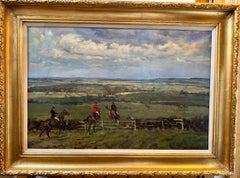 English Fox hunting scene with hunters jumping, hounds chasing in a landscape