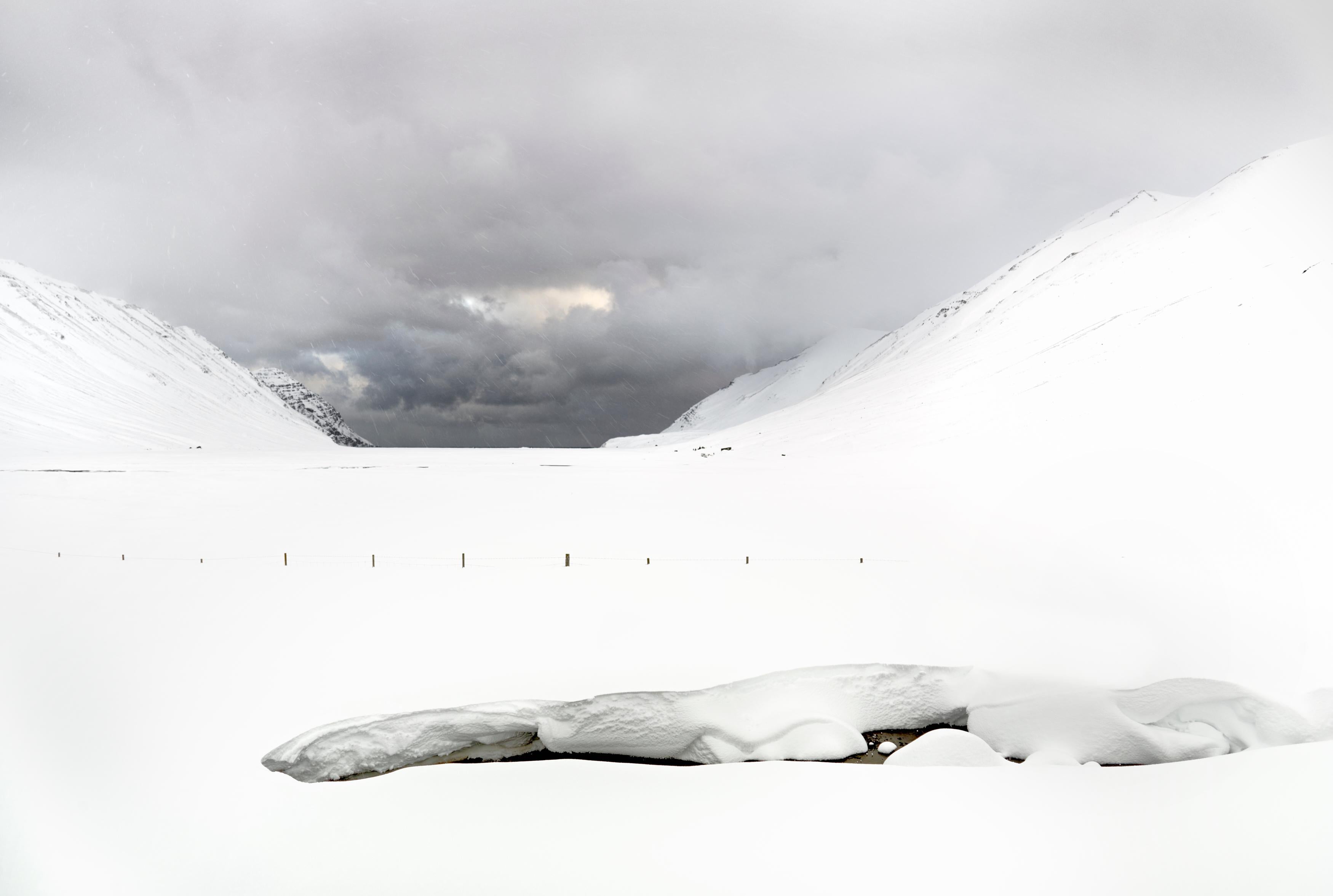 Neil Folberg. Iceland, 2018, from the White Winds series. Archival pigment ink print. Image size 22.5x29.5" Frame size; 30x36".  Edition of 8. 

A former student of the American landscape photographer Ansel Adams, Neil Folberg is known for his color