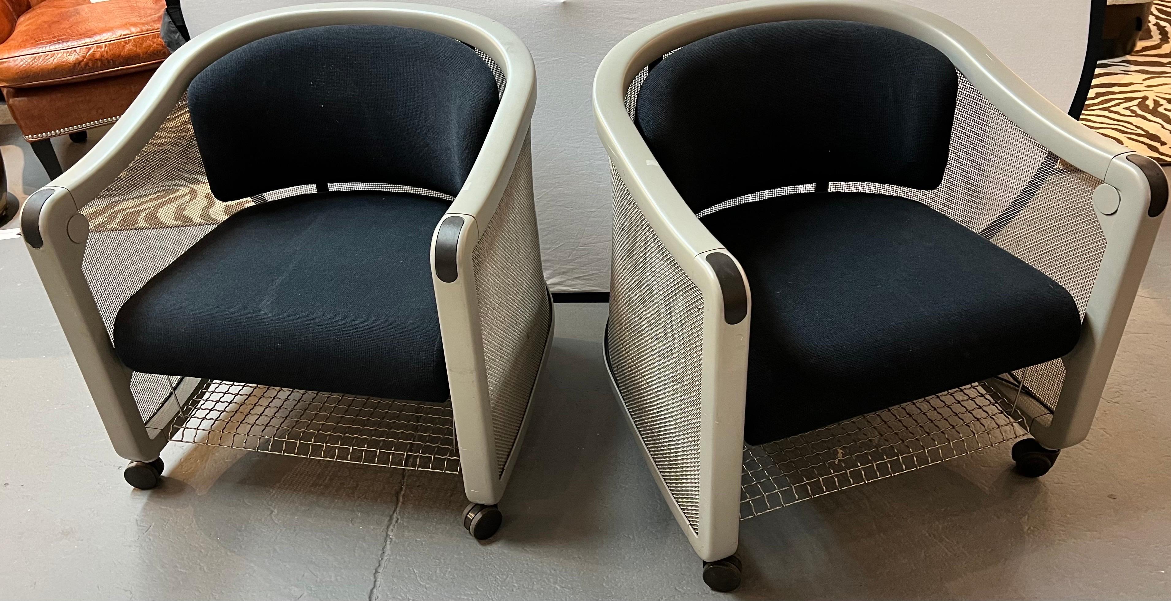 Neil Frankel for Knoll mid century wheeled office lounge chairs - set of 2 - matching colors. On caster wheels for ease of movement.
These chairs are 28 wide x 25 deep x 28 inches high, with a seat height of 16 and arm height of 27 inches. Gray in