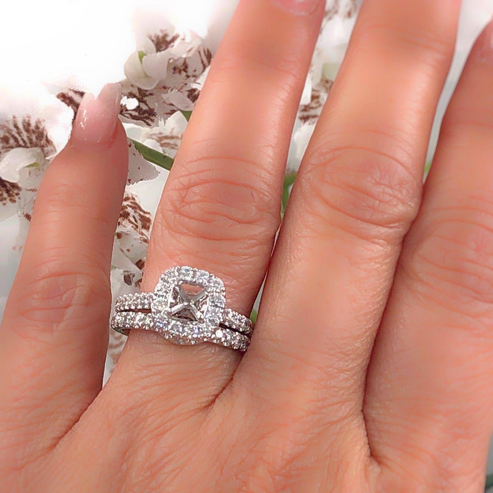 NEIL LANE BRIDAL
Style:  1.00 tcw Diamond Halo Semi-Mount with Band Set
Sku Number:  #562023500
Metal:  14k White Gold
Size:  6.5 - sizable
Total Carat Weight:  1.00 tcw
Diamond Shape:  75 Round Diamonds / 52 in setting & 23 in band
Diamond Color &