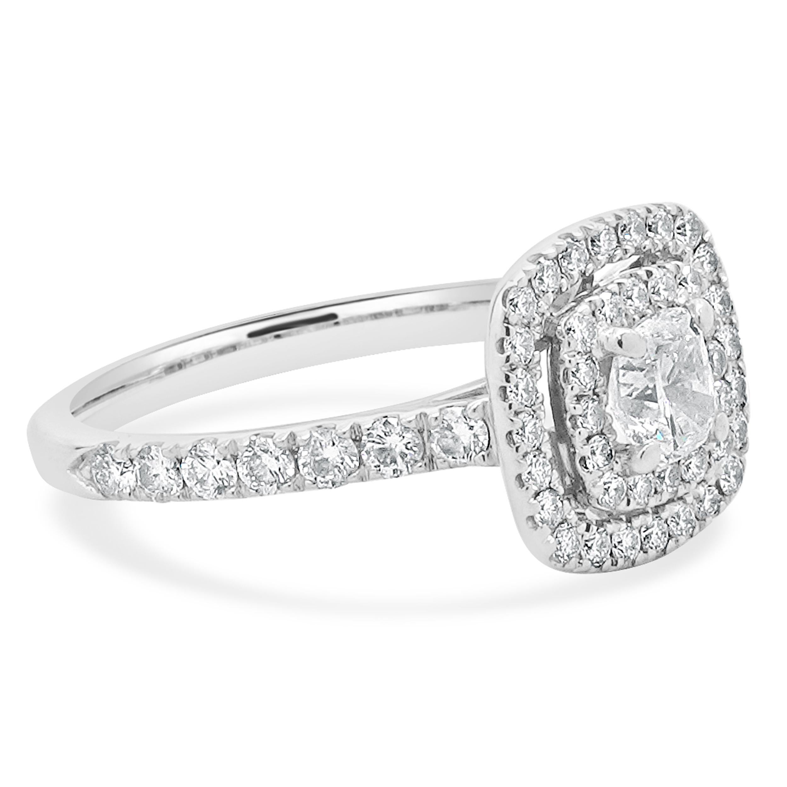 Designer: Neil Lane
Material: 14K white gold
Center Diamond: 1 cushion cut = 0.46ct
Color: H
Clarity: I1
Diamond: 54 round brilliant cut = 0.70cttw
Color: G
Clarity: SI1-2
Size: 6.75 complimentary sizing available
Dimensions: ring top measures 11mm