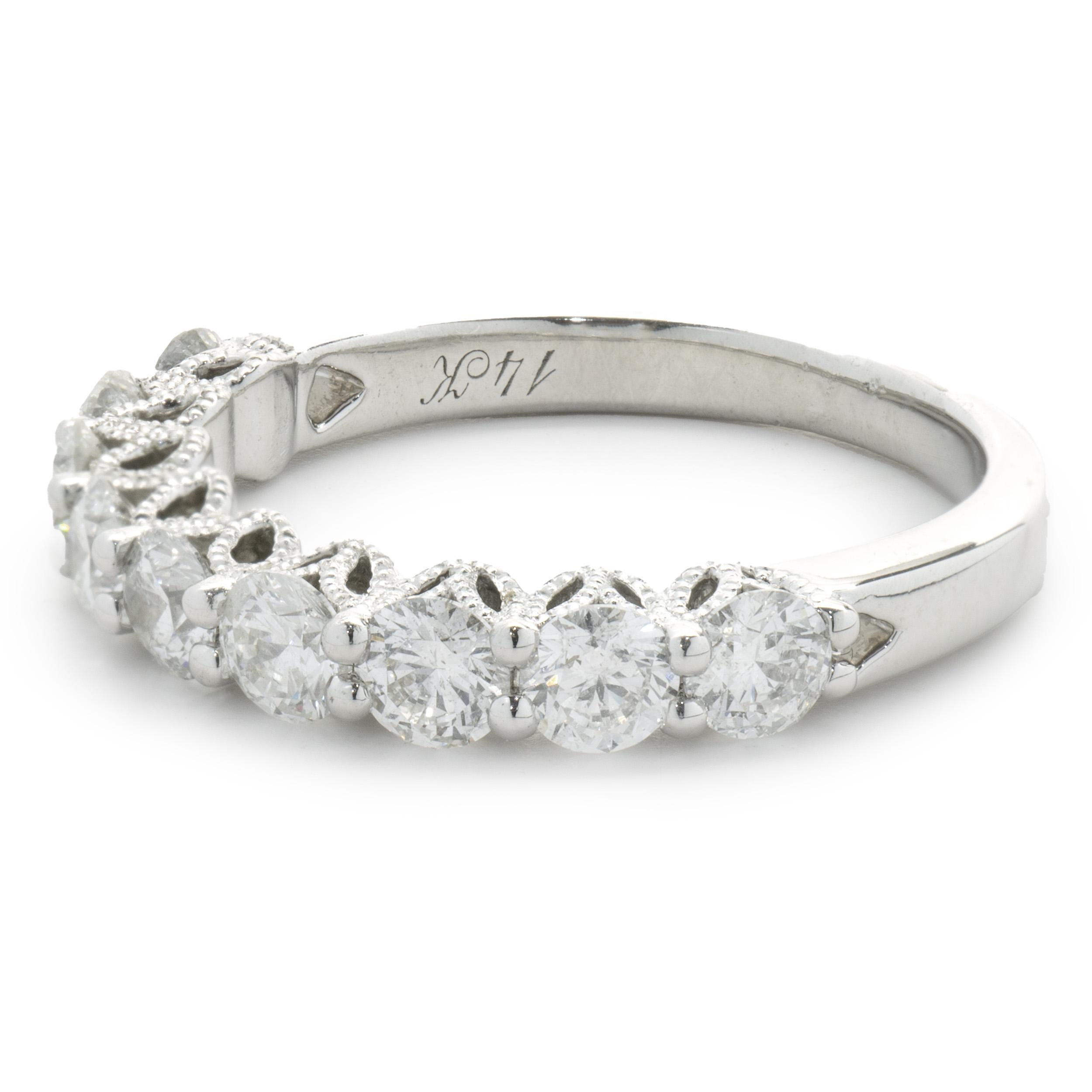 Designer: Neil Lane
Material: 14K white gold
Diamonds: 9 round brilliant cut = 1.53cttw
Color: G
Clarity: VS1-2
Size: 7.75 sizing available 
Dimensions: ring measures 3mm in width
Weight: 3.86 grams