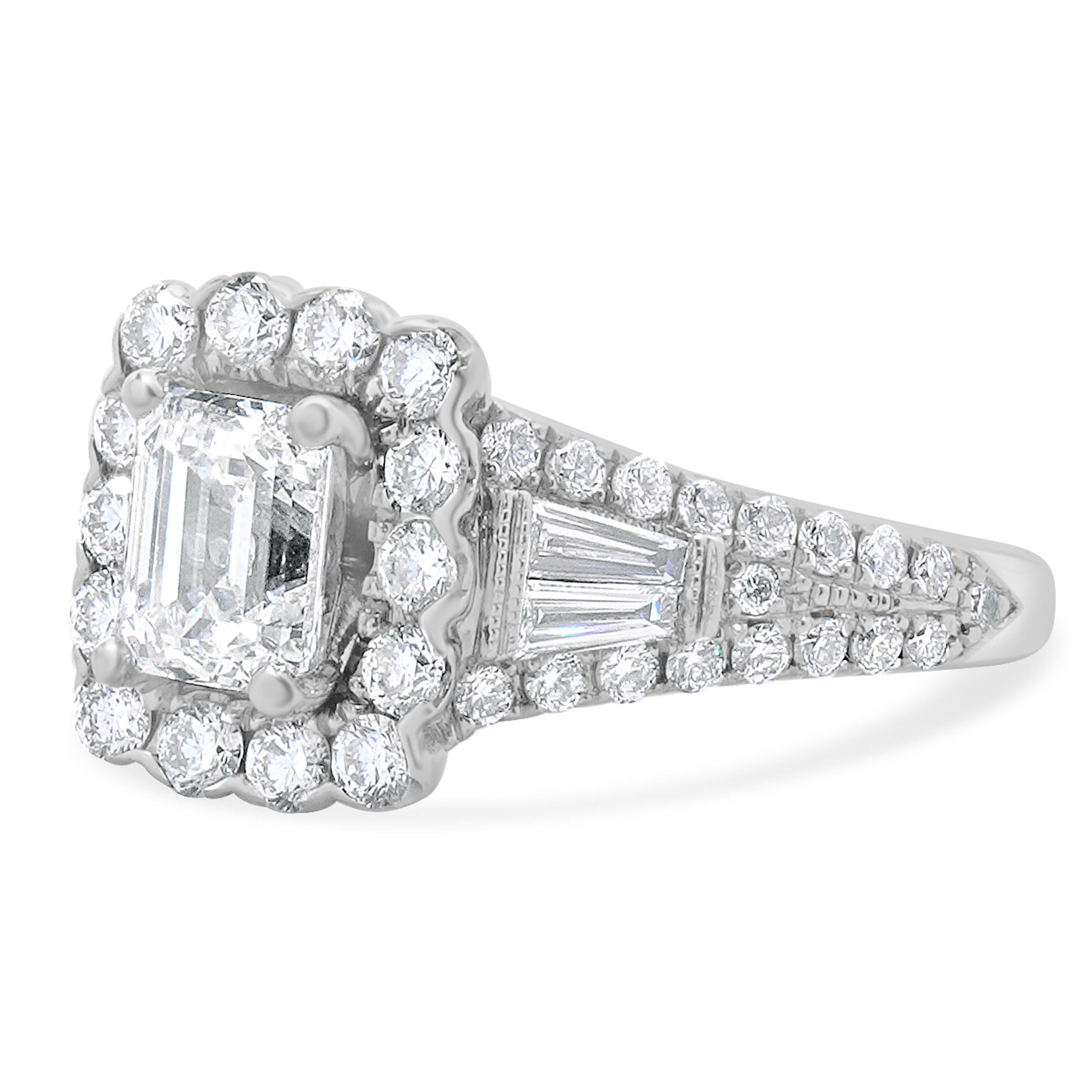 Designer: Neil Lane
Material: 14K white gold
Diamond:  1 Emerald cut = 1.00ct
Color: I
Clarity: SI1
Diamond:  4 baguette cut = 0.04cttw
Color: I
Clarity: I1
Diamond:  54 round brilliant cut = 0.85cttw
Color: I
Clarity: I1
Dimensions: ring top