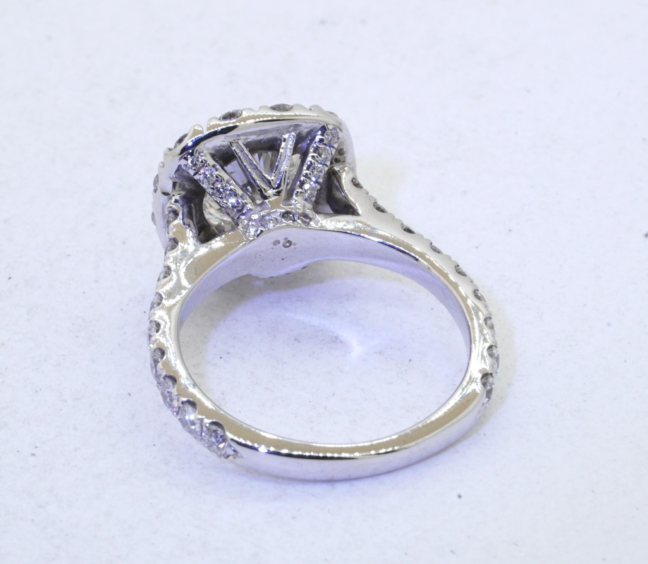 Neil Lane 14K white gold 3.20CT diamond wedding engagement ring size 5.5. This beautiful piece of jewelry is crafted in gorgeous 14K white gold and features 31 diamonds with a combined weight of approx. 3.20CT. This includes an approx. 1.40CT center
