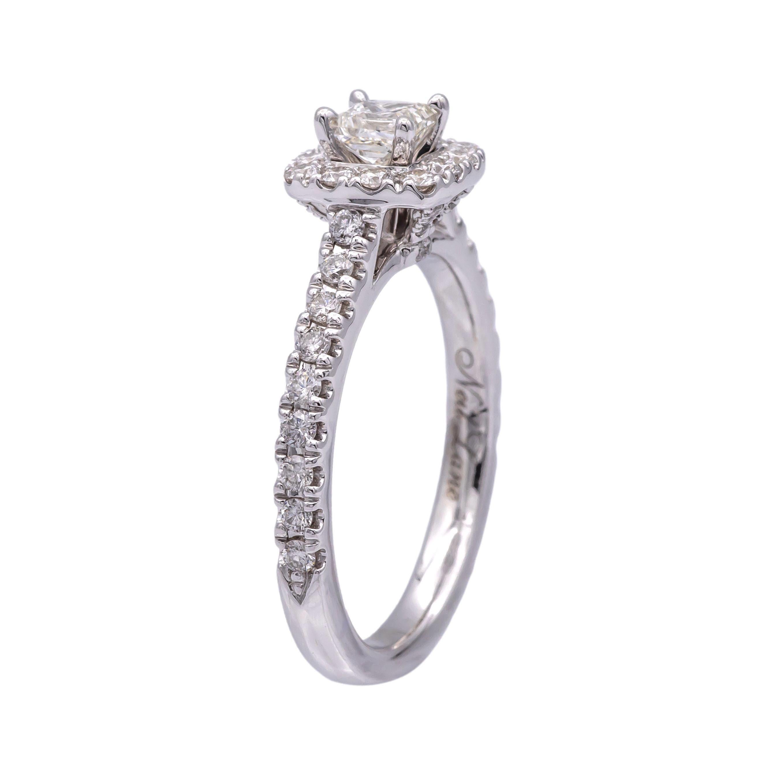 Diamond Engagement ring designed by Neil Lane finely crafted in 14 karat white gold featuring a princess cut diamond center weighing 0.26 carats approximately ranging I-J color, SI1-SI2 clarity adorned by 1 row of bead set diamonds creating a
