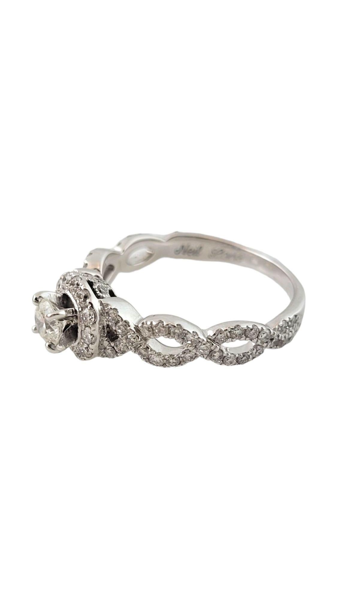 14K Neil Lane White Gold Diamond Ring Size 7.25

This gorgeous 14K white gold ring is decorated with 69 gorgeous, sparkling, round brilliant cut diamonds!

Approximate total diamond weight: 1.01 cts

Center diamond clarity: I1
Center diamond color: