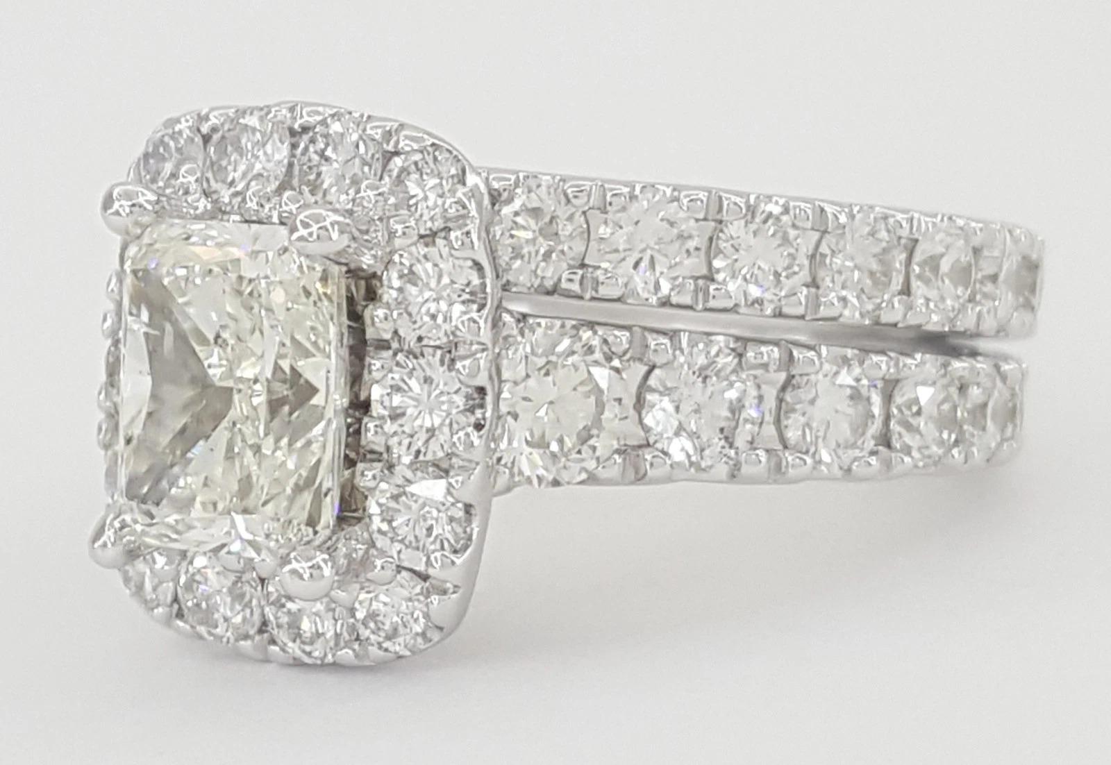 Neil Lane 3.00 CTW Radiant Cut Diamond Halo Engagement Ring Set in 14K In New Condition For Sale In Chicago, IL