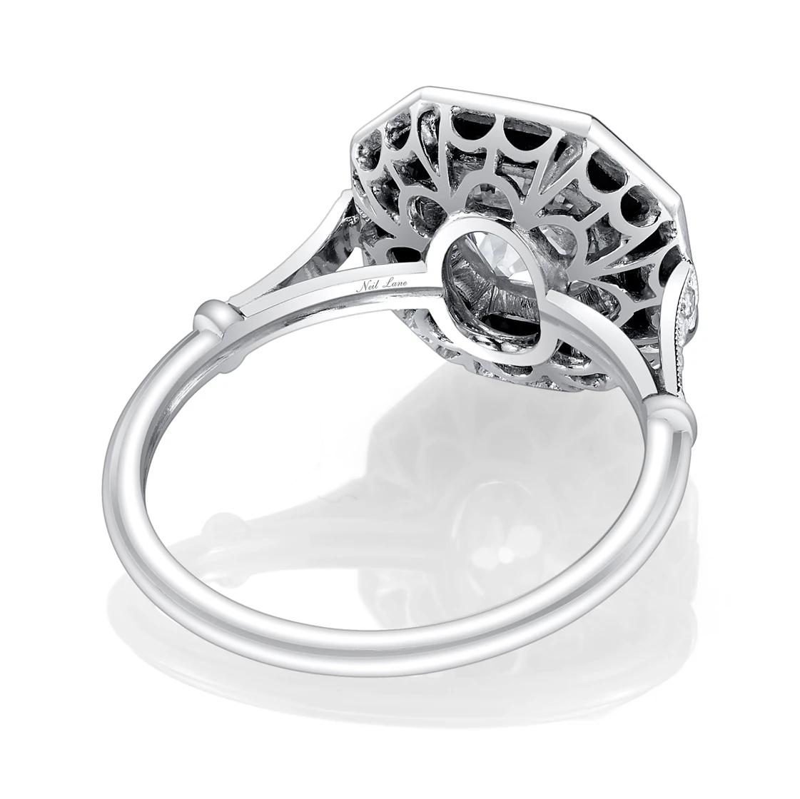 Reminiscent of the roaring 20’s “Jazz Age”, this chic Art Deco inspired handmade platinum ring centers upon an Old European-cut diamond weighing 1.00 ct., set in an octagonal shaped frame of calibre-cut onyx.

Center Stone Color: I

Center Stone