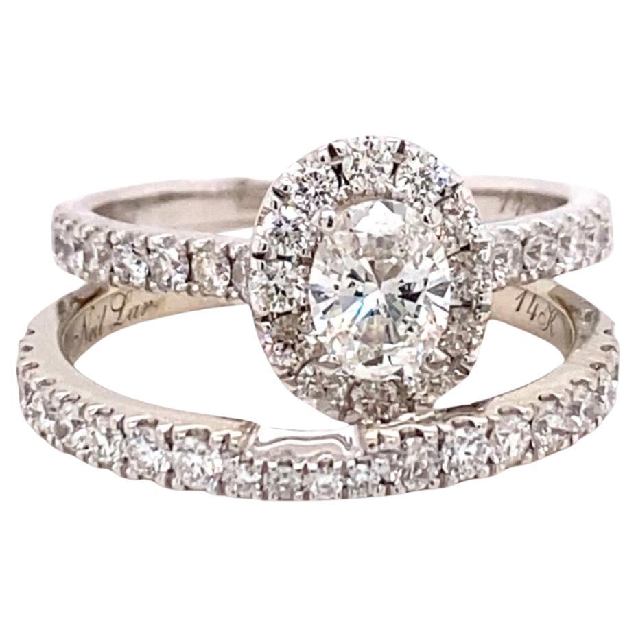 Ensemble bague de fiançailles et anneau de mariage Neil Lane avec halo de diamants ovales 1,88 carat