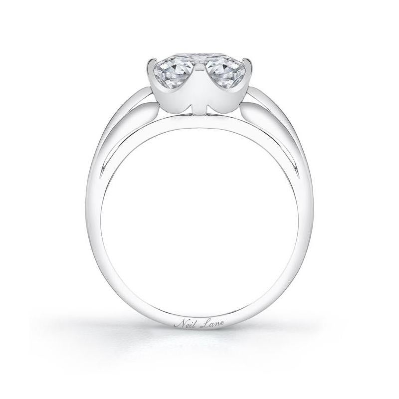 A stylish and sleek handmade platinum ring centers upon a cushion brilliant-cut diamond weighing 2.00 cts., I Color & SI1 Clarity.

Designed & signed by Neil Lane.
