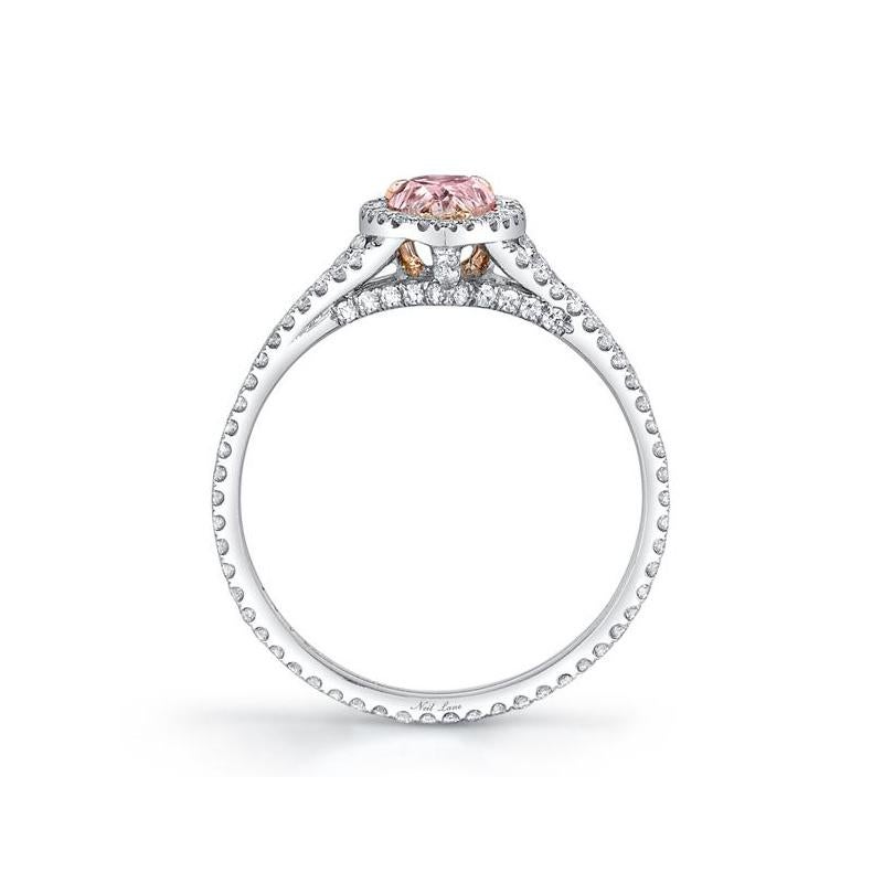 Centering upon a pear brilliant-cut Natural Fancy Light Pink Brown diamond weighing 0.66 ct., set in a platinum ring with a double shank complimented by one hundred fifty-seven single-cut diamonds weighing 0.70 ct.

Designed & signed by Neil Lane.