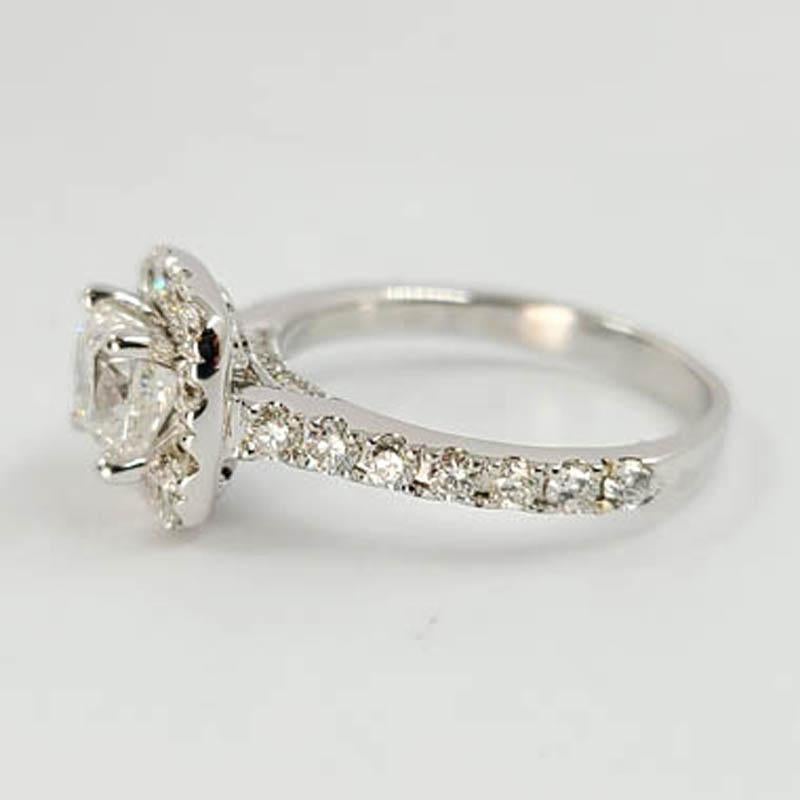 Neil Lane 14 Karat White Gold Diamond Engagement Ring Featuring A 0.95 Carat Cushion Modified Brilliant Cut Diamond (GIA #2215084879) I1 Clarity & G Color Center Stone Surrounded By 26 Round Diamonds of SI Clarity & H Color Totaling 0.78 Carats for