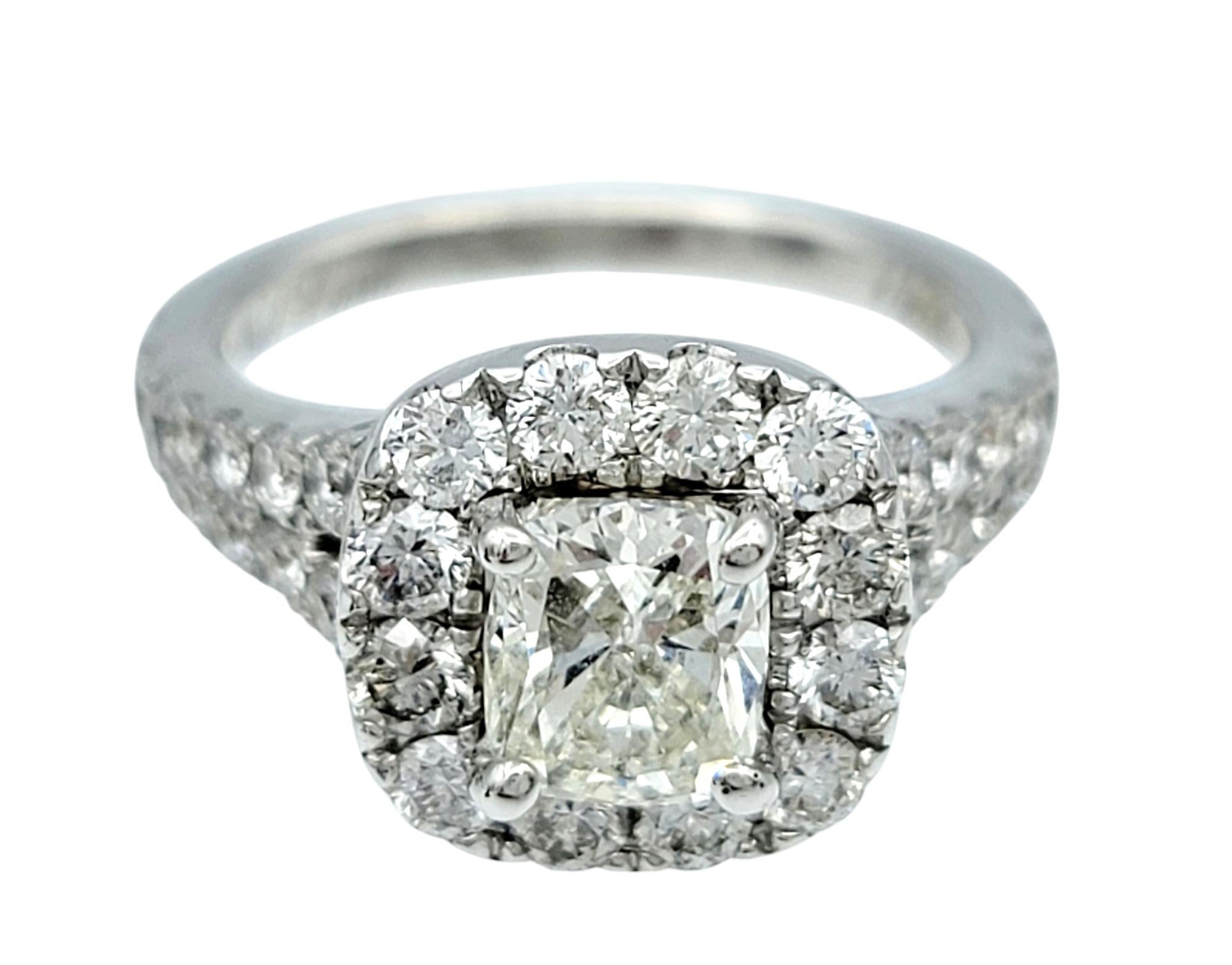 Ring Size: 5 

Celebrate your love story with this stunning cushion cut diamond halo engagement ring, a true embodiment of timeless romance and brilliance. At its center, a dazzling 1.06 carat cushion cut diamond takes the spotlight, radiating
