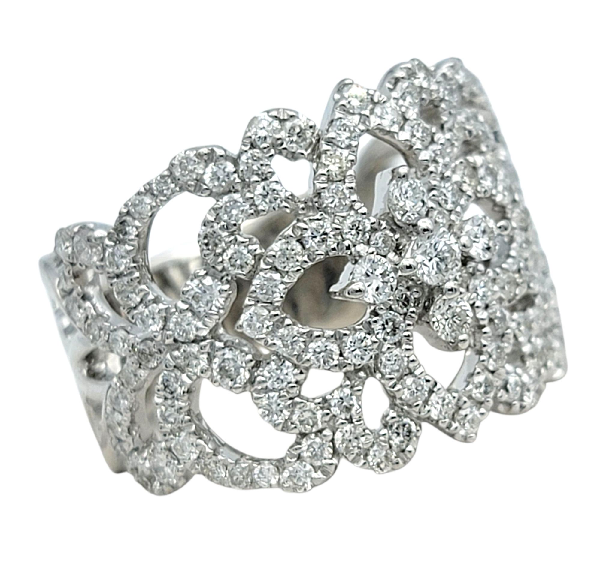 Ring Size: 5.5

This breathtaking Neil Lane diamond ring is a celebration of craftsmanship and elegance. Designed in 14 karat white gold, the ring showcases a beautifully intricate band adorned with a stunning array of round brilliant cut diamonds.