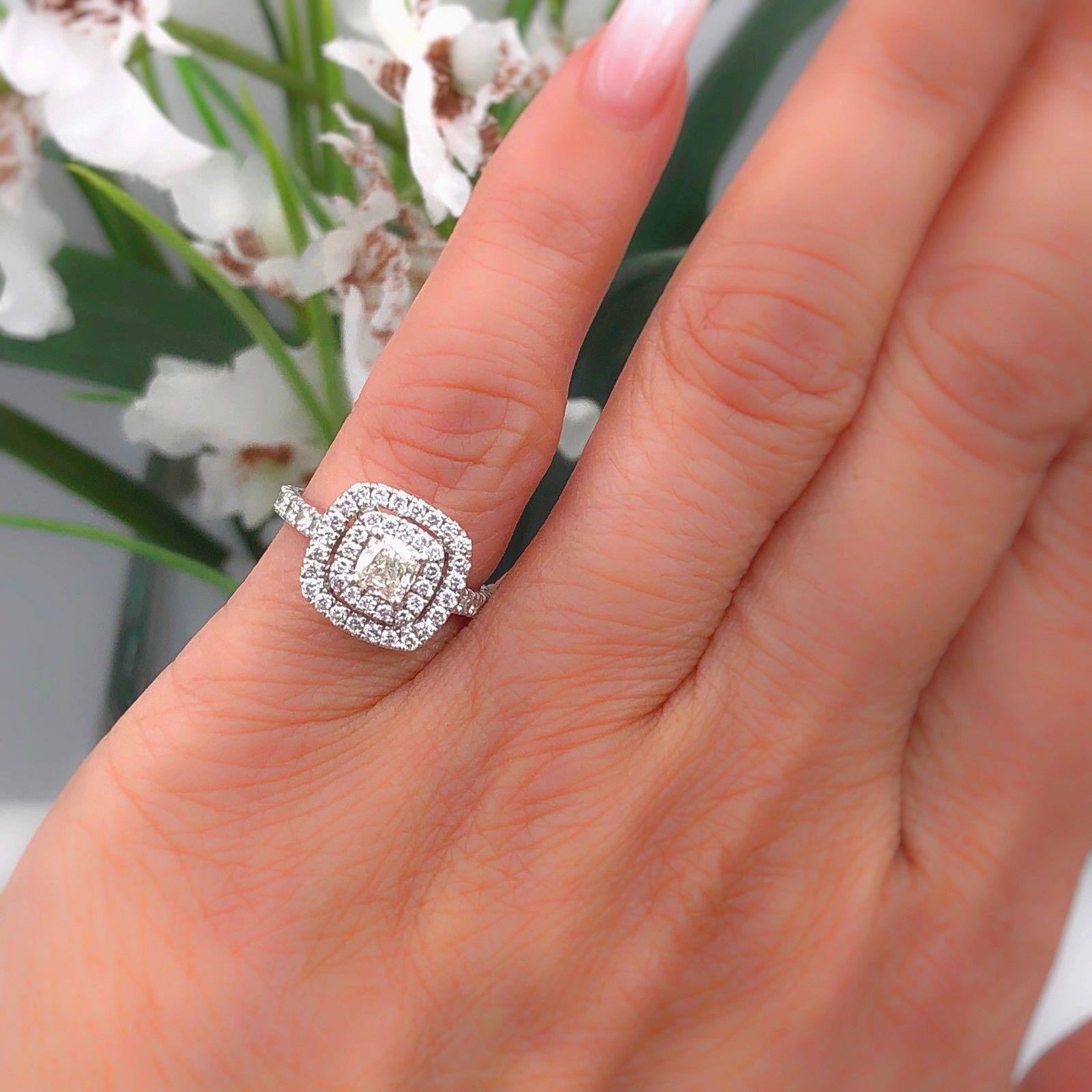 NEIL LANE BRIDAL COLLECTION
Style:  Double Halo Pave Diamond Engagement Ring
Item Number:  940285416
Metal:  14KT White Gold
Size:  3.75 - Sizable
Total Carat Weight:  1.125 TCW
Center Diamond Shape:  Cushion Cut 0.50 CTS
Diamond Color & Clarity:  I