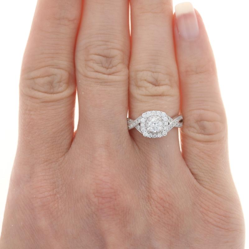 Retail Price: Retail Price: $3500

Size: 5
Sizing Fee: Up 2 sizes for $70

Brand: Neil Lane

Metal Content: 14k White Gold

Stone Information

Natural Diamond
Carat(s): .33ct
Cut: Round Brilliant
Color: G
Clarity: I1
Stone Note: (solitaire)

Natural