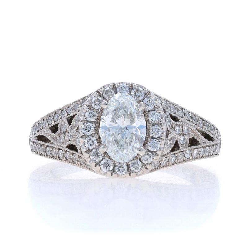 Retail Price: $6599

Size: 5 3/4
Sizing Fee: Up 1/2 a size for $40

Brand: Neil Lane

Metal Content: 14k White Gold

Stone Information
Natural Diamond
Carat(s): .70ct
Cut: Oval
Color: F
Clarity: SI2
Certified by: GIA
Report Number: