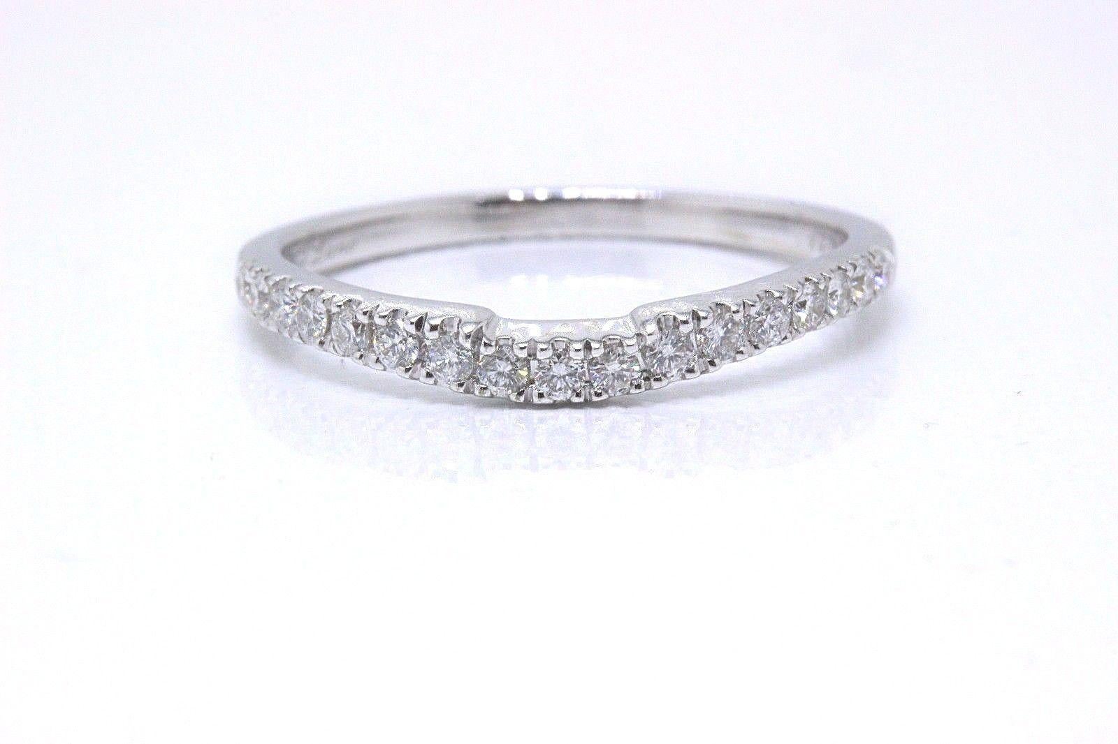 NEIL LANE BRIDAL
Style:  Contoured Wedding Band
Sku Number:  #940250424
Metal:  14KT White Gold
Width:  2 MM / 2 MM Height
Size:  6 - Sizable
Total Carat Weight:  0.50 TCW
Diamond Shape:  17 Rounds 
Diamond Color & Clarity: I / I1
Hallmark:  NEIL
