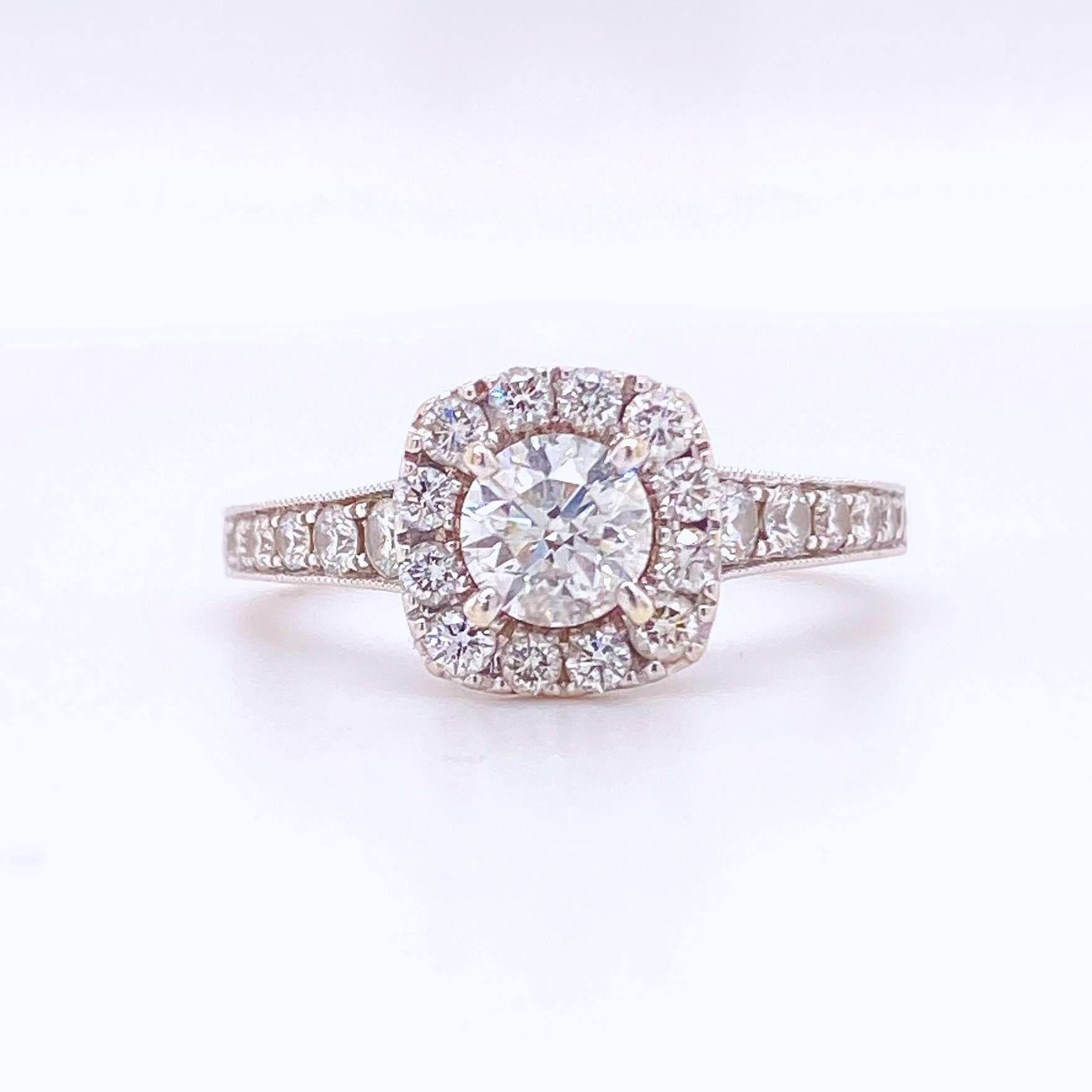 Neil Lane Bridal Halo Diamond Engagement Ring
Style:  Halo
Ref. number:  #940296015
Metal:  14k White Gold
Size:  7 sizable
TCW:  1 1/6 tcw / 1.16 tcw
Main Diamond:  Round Diamond 0.62 cts / 5/8 cts
Color & Clarity:  I / I1
Accent Diamonds:   Round