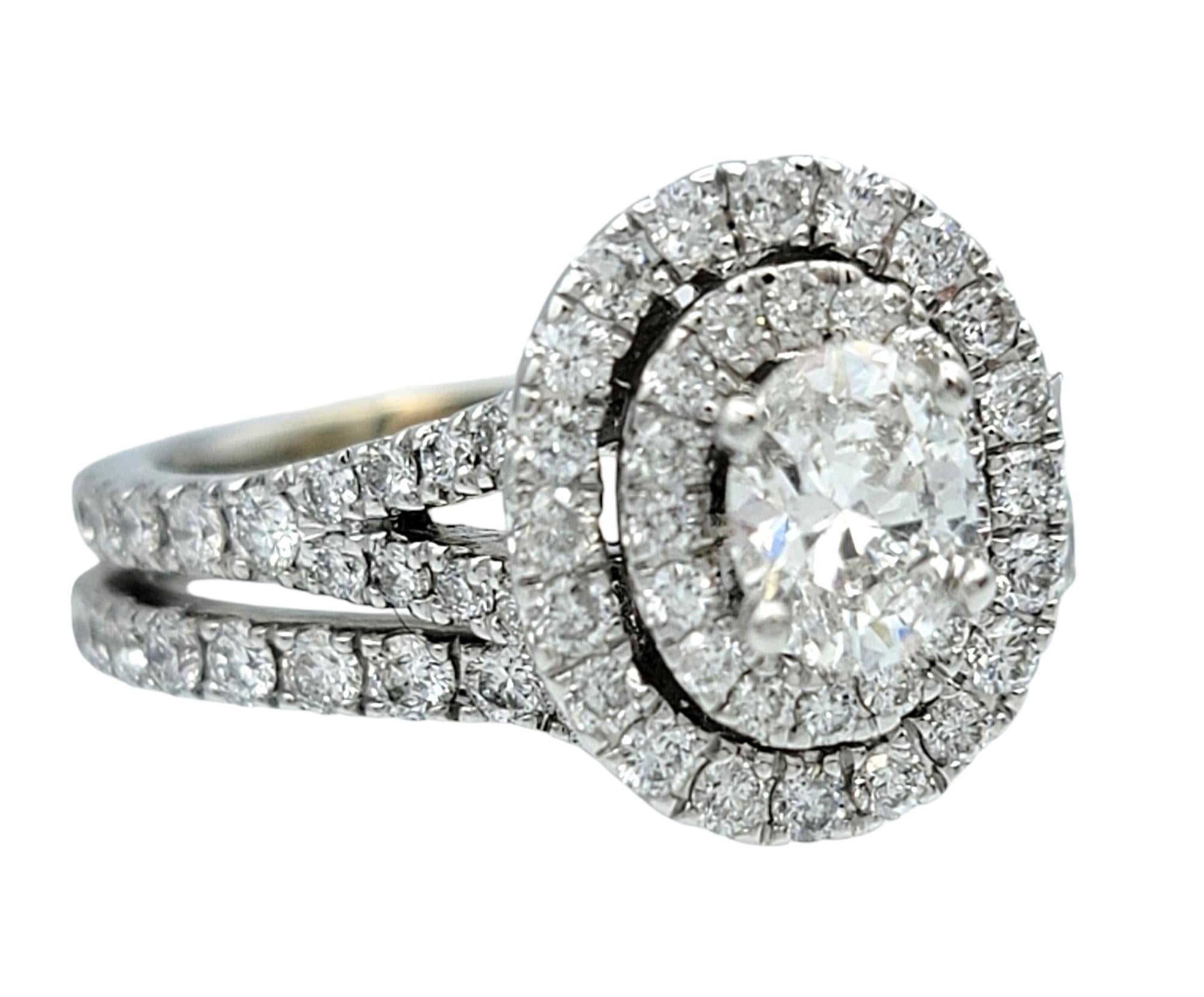 Ring Set Size: 5.5 

Celebrate your love story with the timeless elegance of this Neil Lane wedding ring set, a breathtaking union of artistry and romance. The engagement ring, a true masterpiece, features a stunning oval diamond, cradled within a