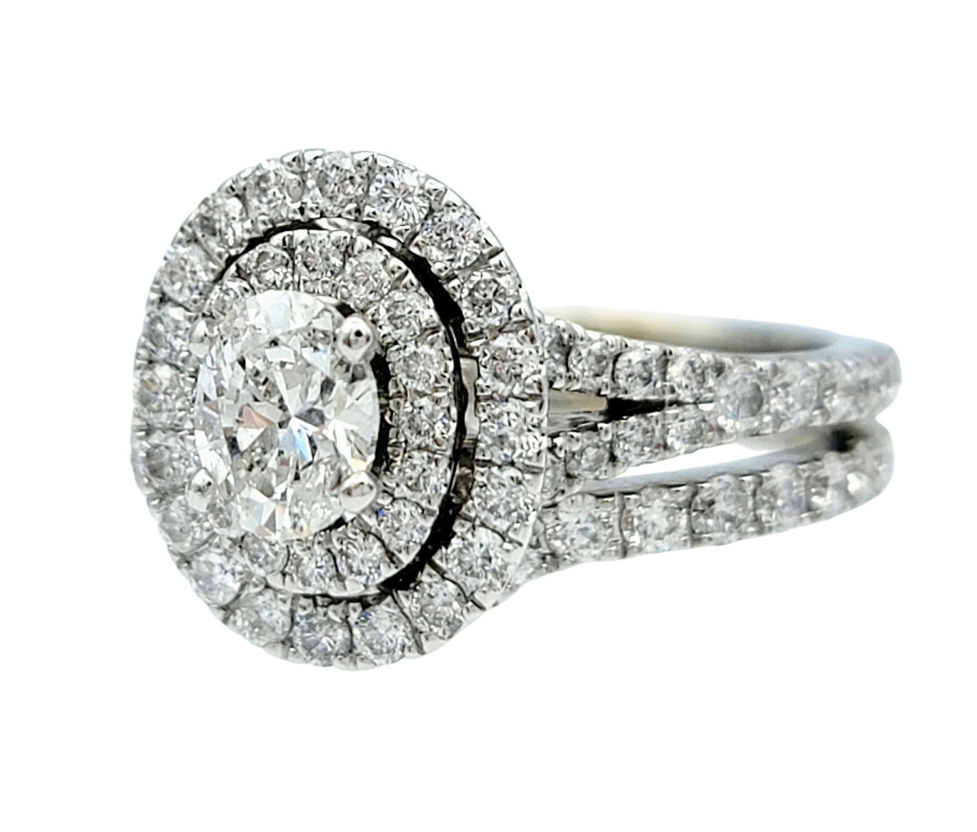 Contemporary Neil Lane Oval Cut Diamond Double Halo Wedding Ring Set in 14 Karat White Gold For Sale