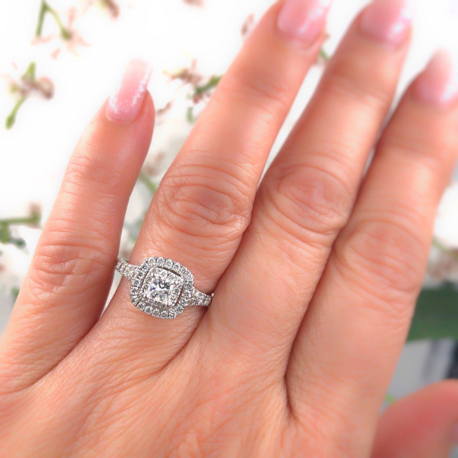 Neil Lane Bridal 
Style:  Double Halo Diamond Engagement Ring
Stock Number:  #940241514
Metal:  14k White Gold
Size:  5.5  - sizable
Total Carat Weight:  1.00 tcw
Diamond Shape:  Princess 0.33 cts 
Diamond Color & Clarity:  I / I1
Accent Diamonds: 