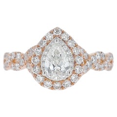 Anillo de compromiso de diamantes en forma de pera de 0,52 quilates en oro rosa de Neil Lane