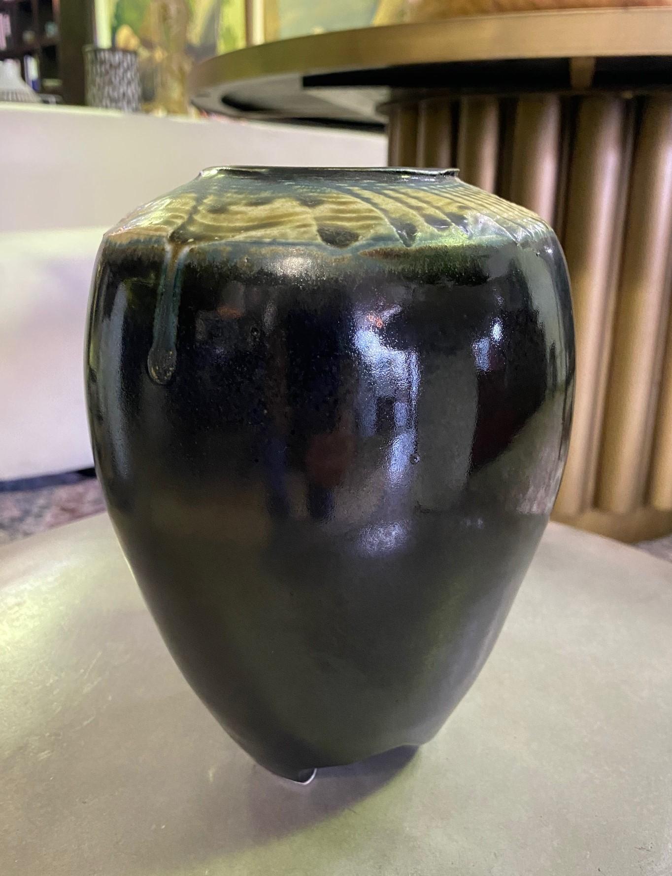 A suberbly crafted, beautifully, and darkly glazed vase by Southern California studio potter/ artist Neil Moss. The workmanship is truly exquisite. 

Moss' work is collected by various institutions and museums. He was featured by the Pasadena Art