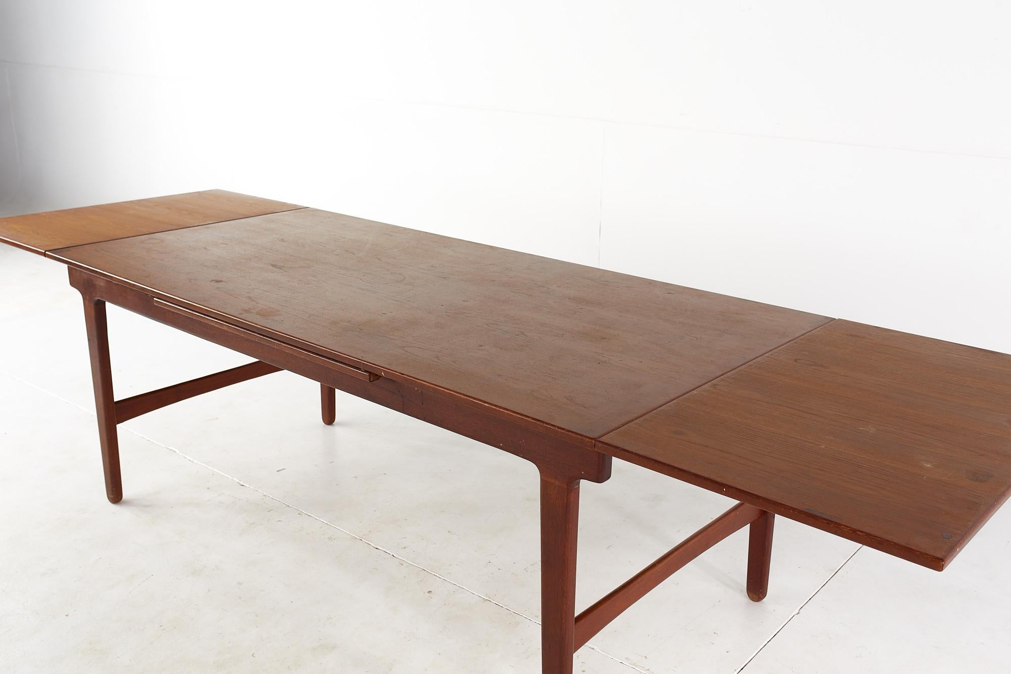 Neils Moller Style Mid Century Danish Teak Hidden Leaf Expanding Dining Table For Sale 5