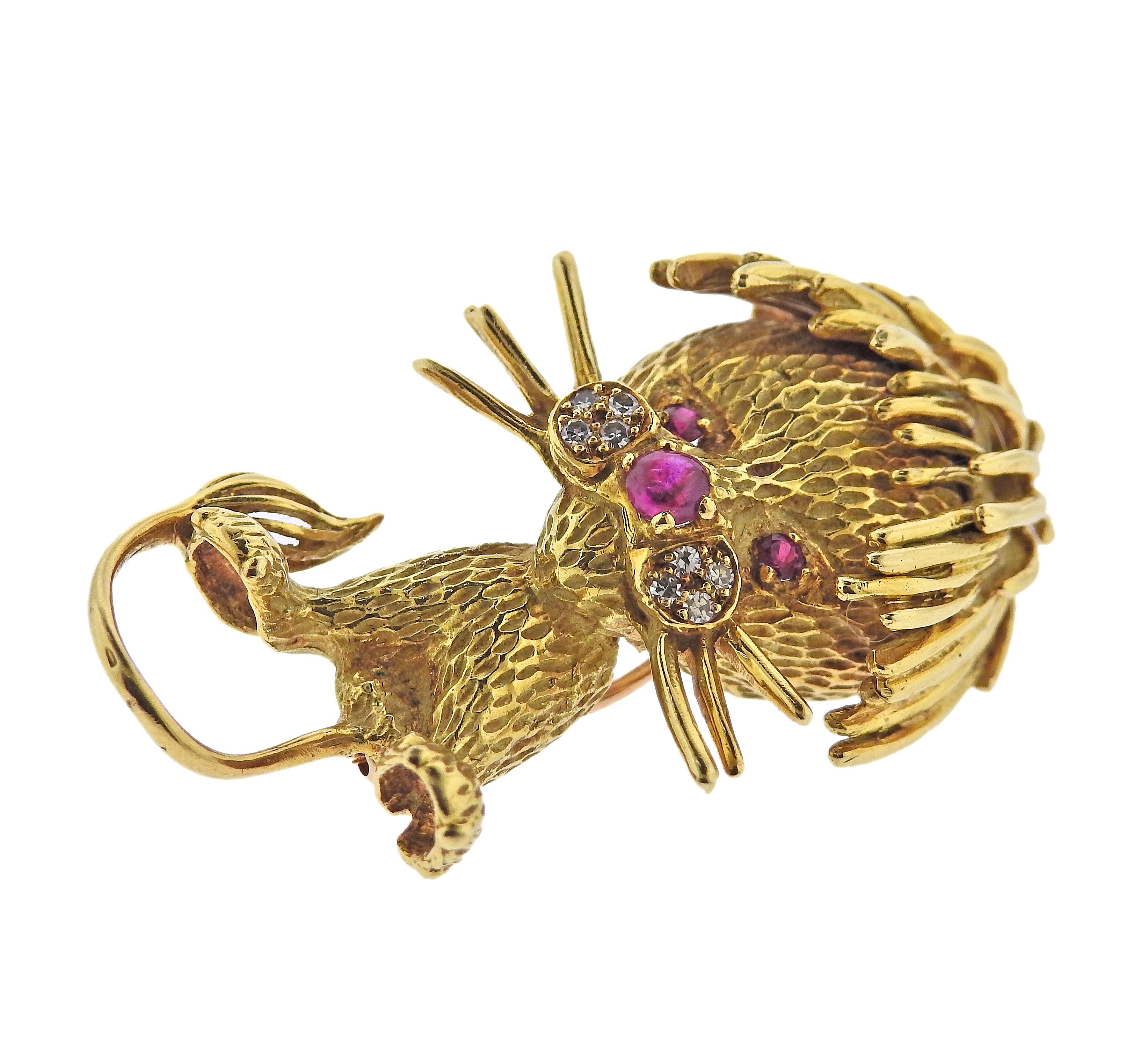1960s vintage Neiman Marcus 18k gold lion brooch, adorned with rubies and approx. 0.08ctw in diamonds. Brooch measures 45mm x 24mm. Marked with a scratch number on the back NM 4922. 18k. Weight - 20 grams.