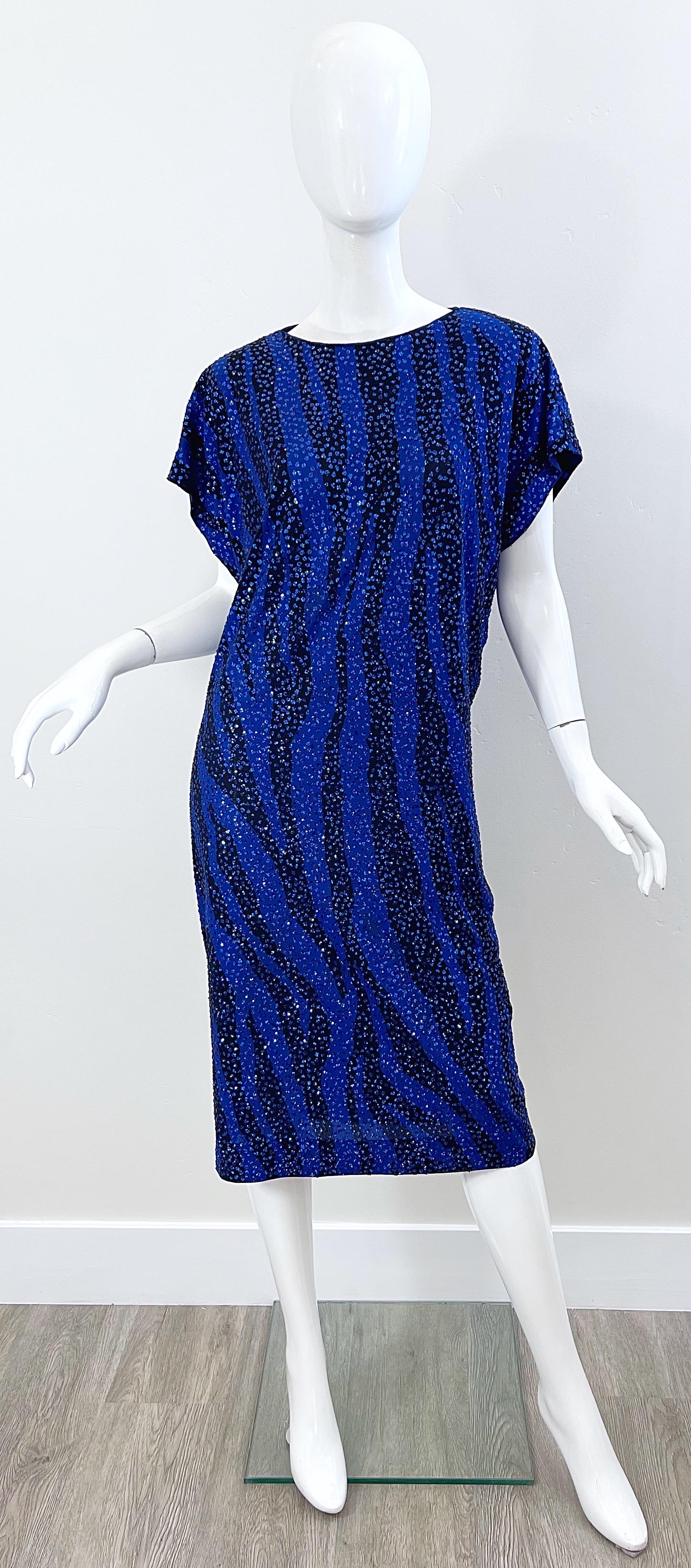 Amazing early 1980s vintage NEIMAN MARCUS royal blue and black zebra animal print glitter encrusted rayon kaftan midi dress ! Simply slips over the head. All glitter work is original, and was attached using glitter glue—you won’t leave a glittery