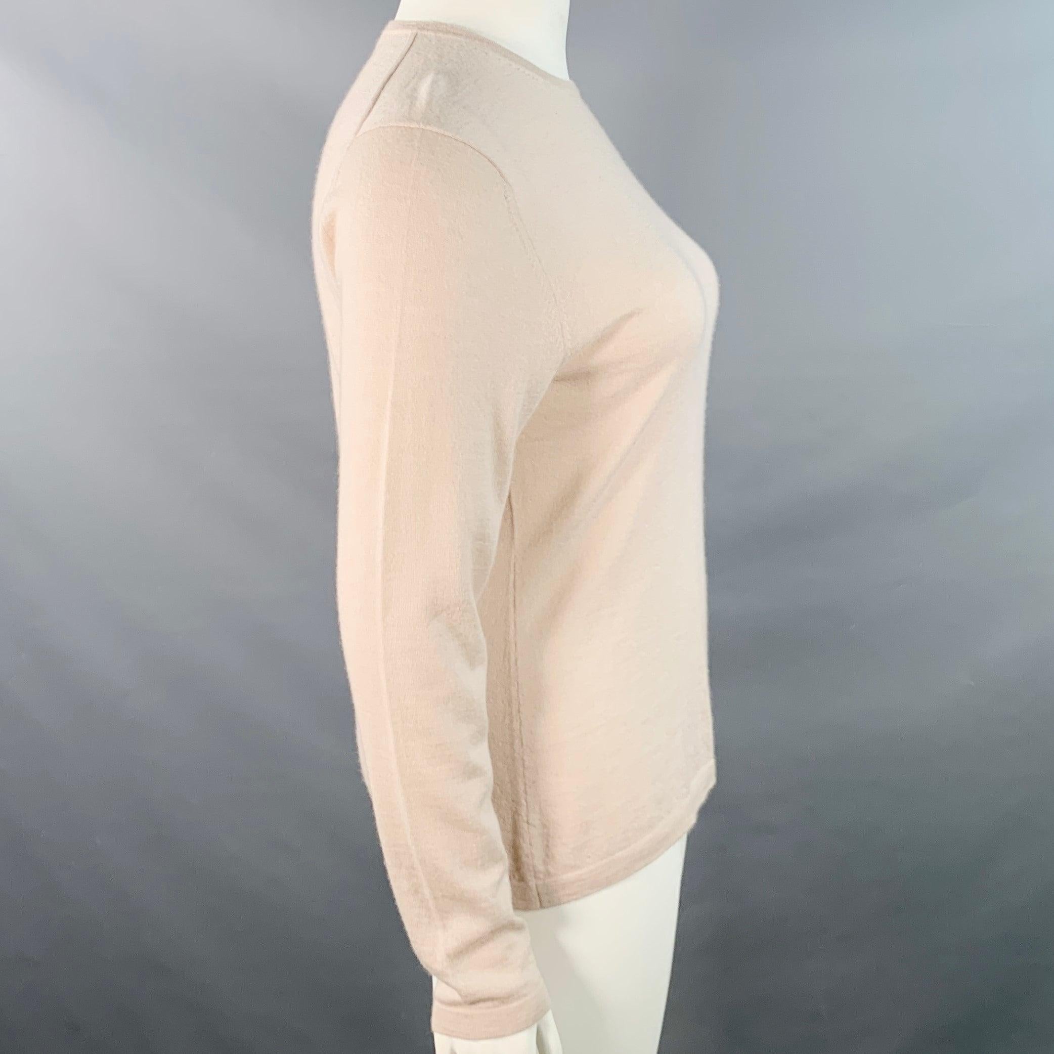 Pullover Neiman Marcus
in maglia di cashmere beige con maniche lunghe e girocollo. Nuovo con etichetta. 

Contrassegnato:   XL 

Misure: 
 
Spalla: 17 pollici Busto: 42 pollici Maniche: 25,5 pollici Lunghezza: 25 pollici 
  
  
 
Riferimento Sui
