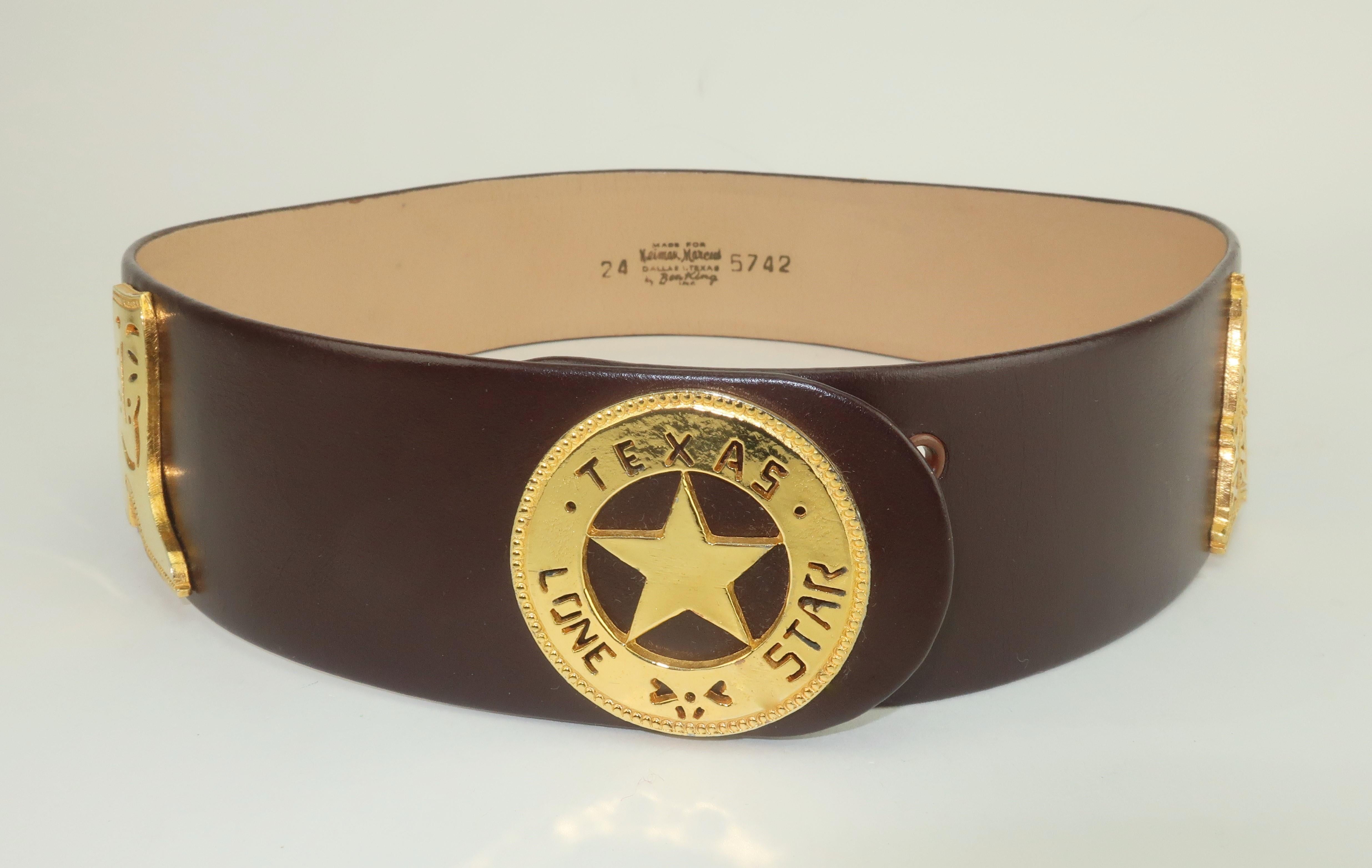 1960's dark brown leather belt by Ben King for Neiman Marcus in Dallas Texas.  The corset style belt has a Lone Star state motif with gold metal charms depicting characteristics of Texas including an oil rig, cowboy boot, saddle and a longhorn.  The