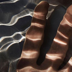 'Nelli's Hand Under Water' photograph from series Light Therapy by Zoltan Tombor