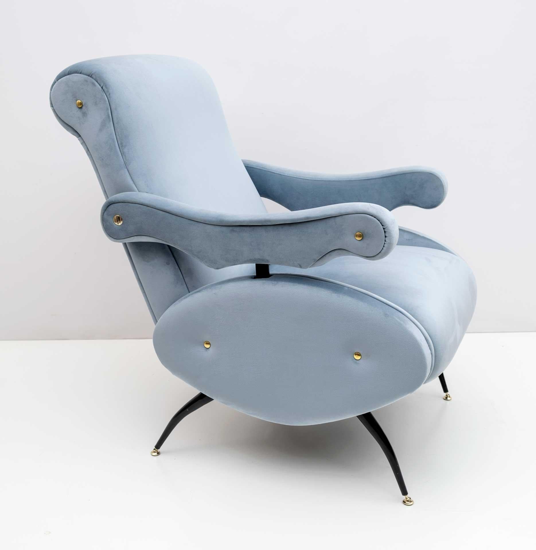 Reclining armchair designed by Nello Pini for Novarredo in the 1950s, the armchair has been restored and upholstered in light blue velvet.