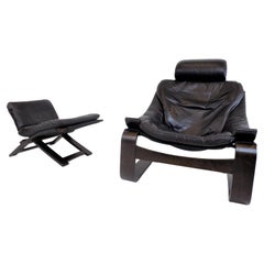 Fauteuil en cuir Nelo Kroken avec pouf par Ake Fribytter