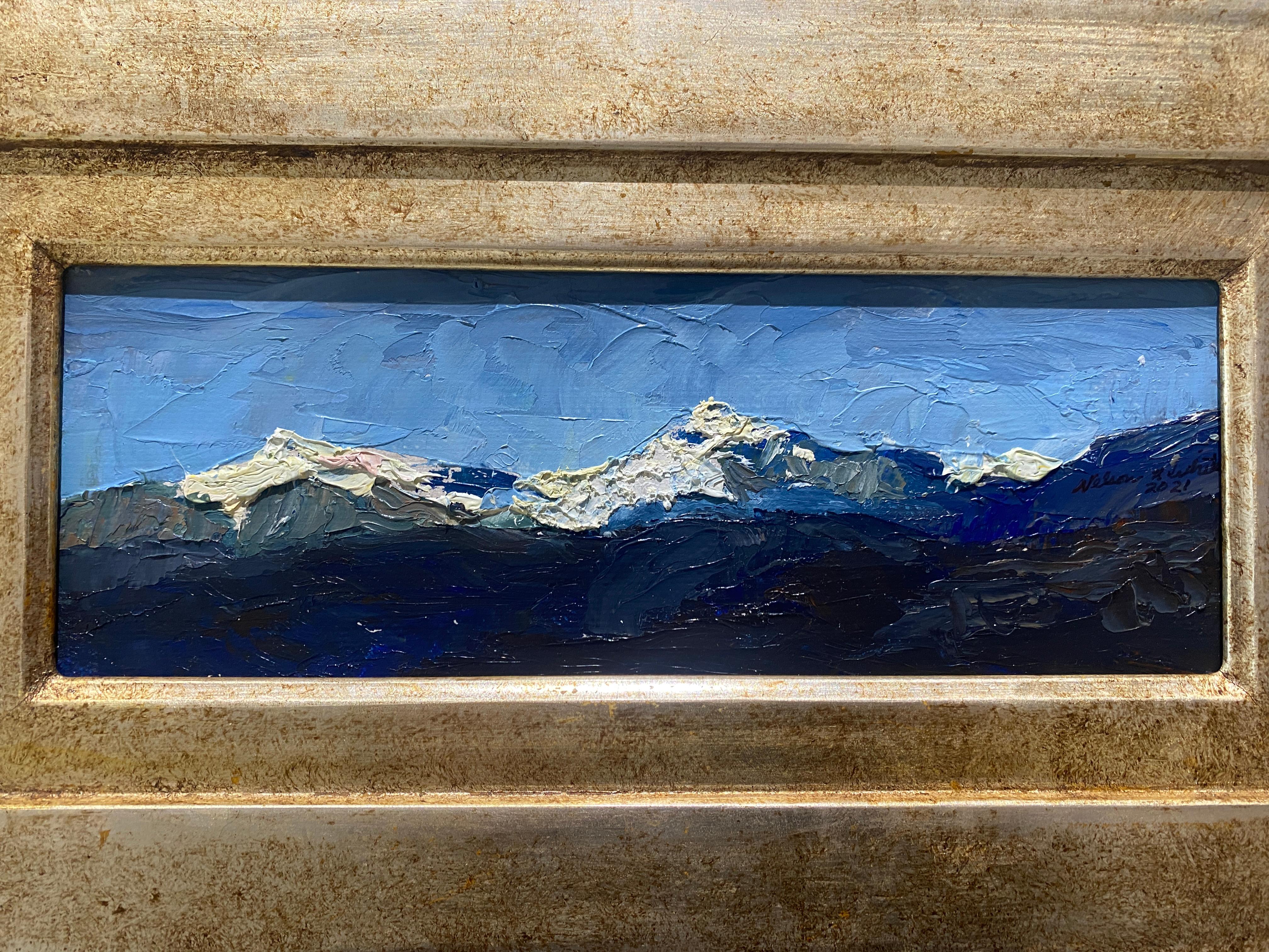 A plein-air oil painting of the Apuan Alps, mountains in Northern Tuscany, Italy by third-generation American Impressionist, Nelson Holbrook White. Painted with thickly applied oil paint and a palette knife, White uses impasto to highlight the