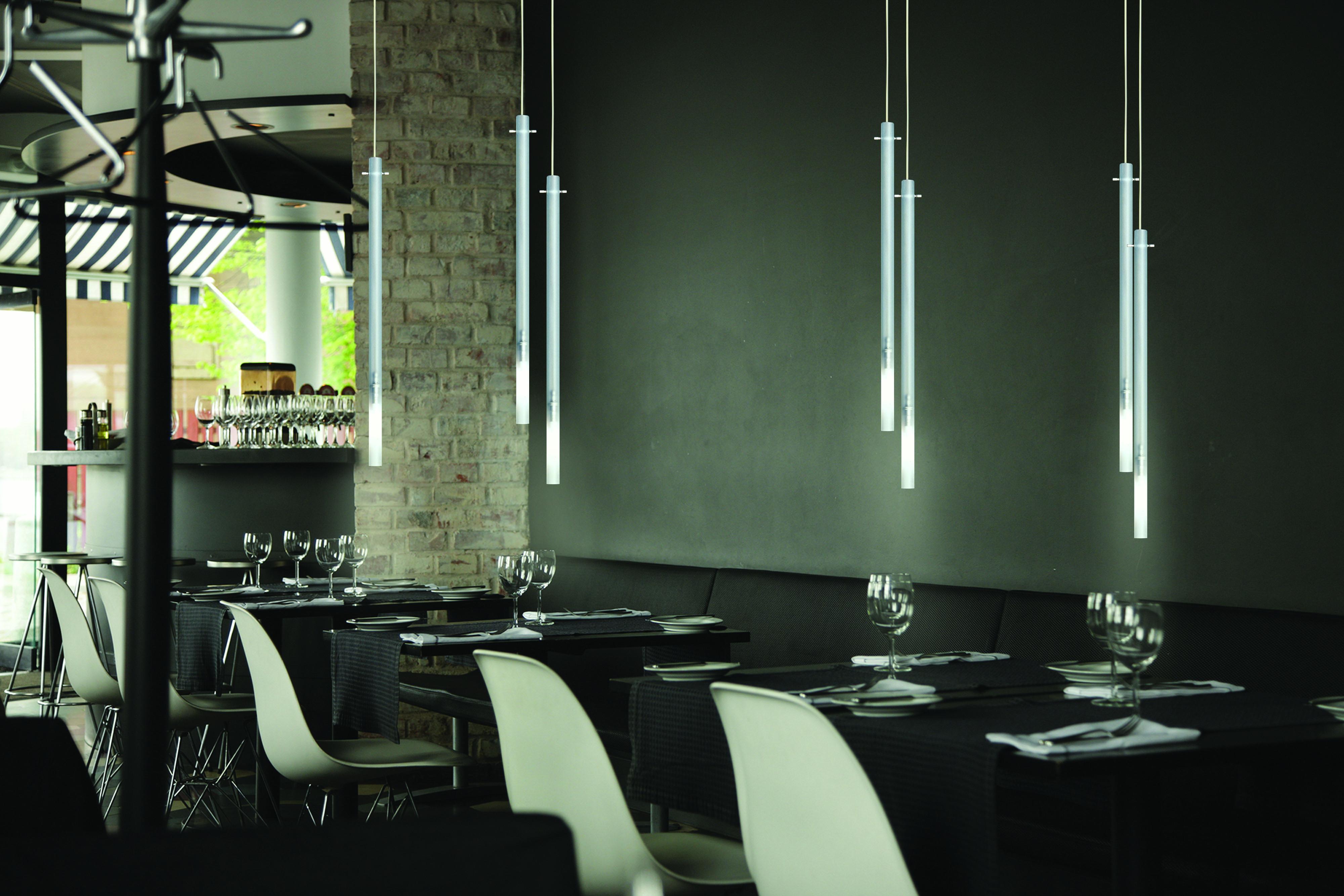 Family of pendant lighting fixtures realized with a satin nickel or burnished gold metal structure connected with a sanded glass cylinder. Available in different length and LED or halogen versions.

Additional information:
Material: Glass
Color &
