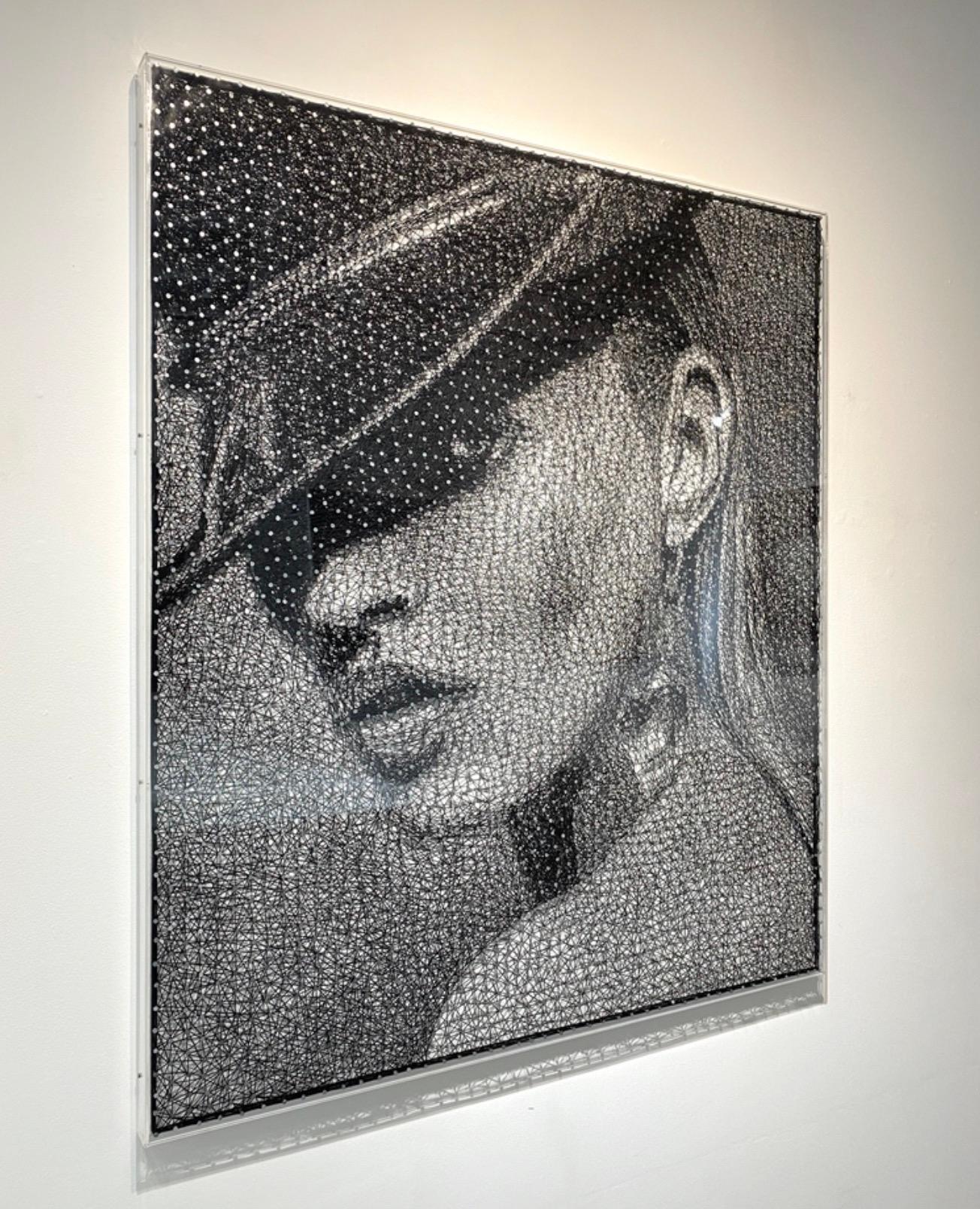 In the latest series, inspired by media, pop culture, and film Jantzen takes Neo-pointillism to the next level utilizing thousands collection of photography, cinematographic stills, and other collected material encapsulated in glass spheres; hiding