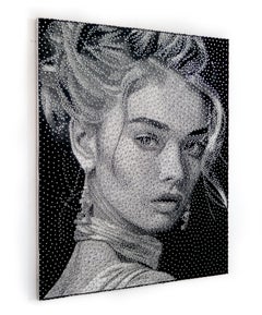 Ritratto in bianco e nero di Nemo Jantzen, un'opera d'arte bella ed elegante, realizzata con un filo di lana.