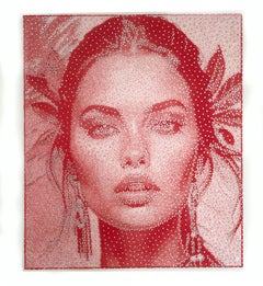 Simmetria perfetta e bellezza in un ritratto di corde rosse fatto a mano da Nemo Jantzen