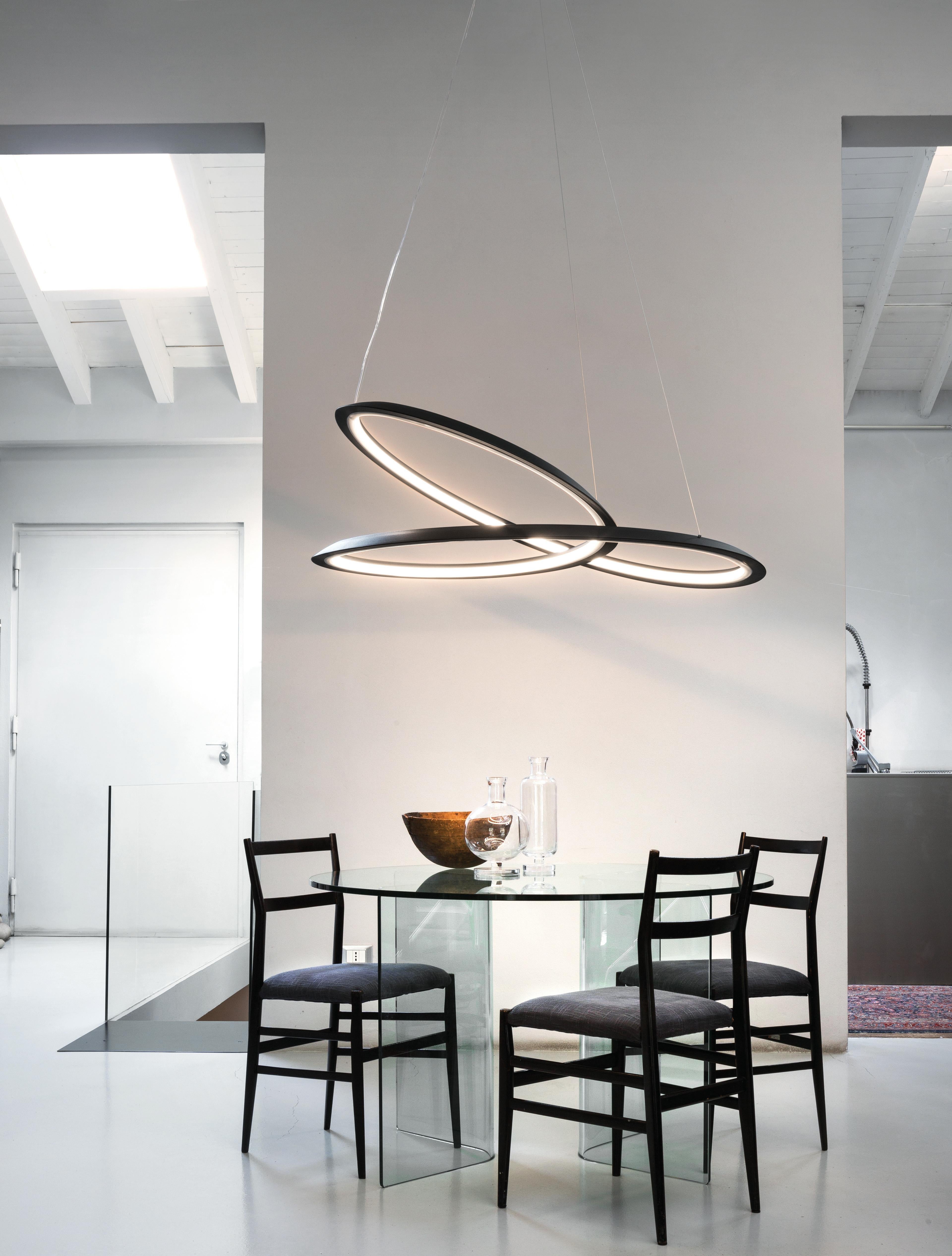 Adjustable cable length 8.2’ max
Linear LED direct 86W 4500lm typ cri 85 120V dimmable 1-10V IP 20 (indoor, dry location) 
uplight 3000K
Pendant lamp available in two sizes Kepler or Kepler Minor. The structure is a painted aluminum extrusion,