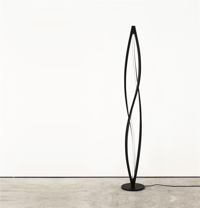 Floor lamp for a warm and widespread LED lighting. The structure is manufactured through a technology of torsion and misalignment of the aluminum extruded bar, expressly studied by Nemo. It allows a 360° LED emission. Terminal parts are in