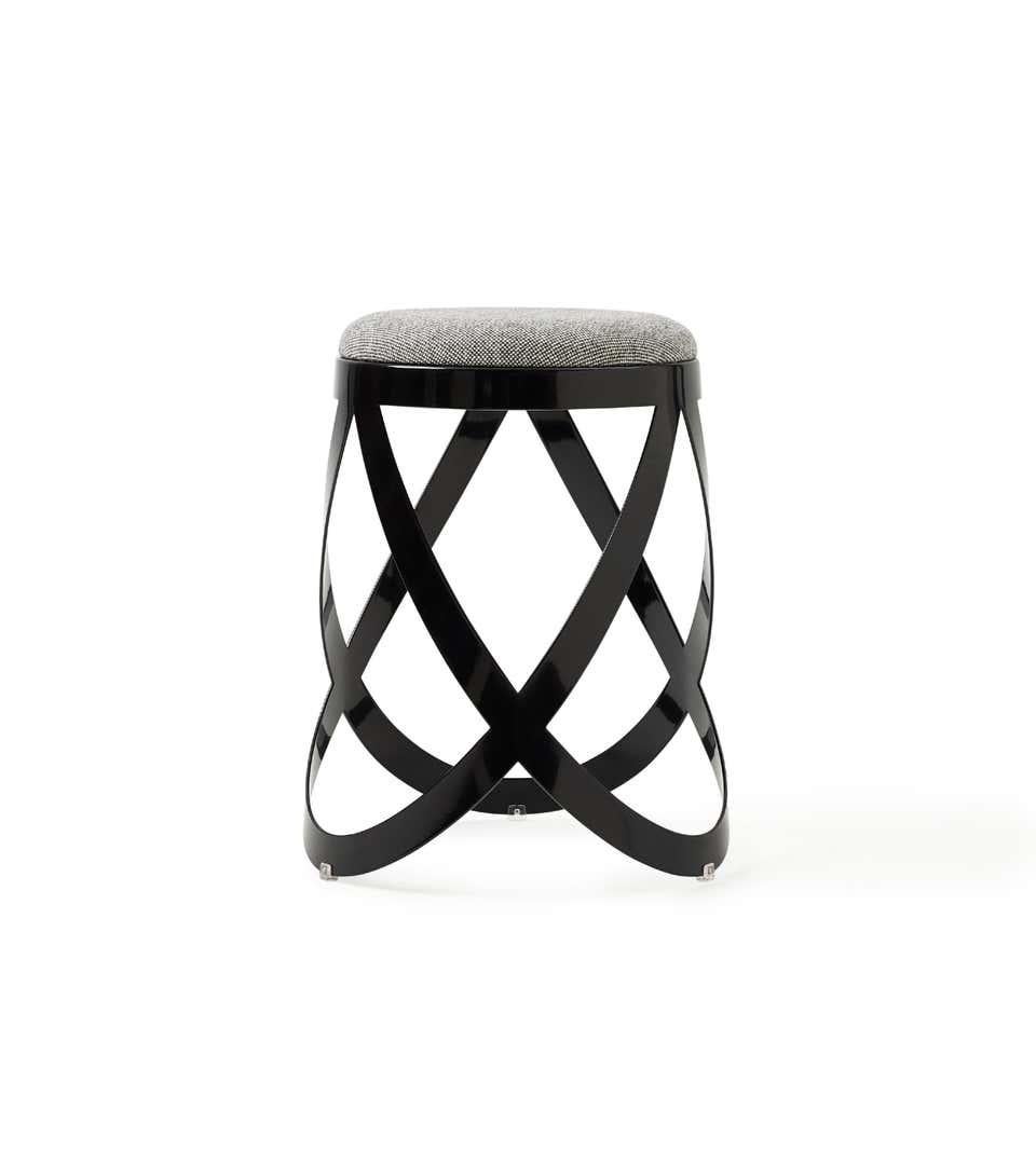 Continuously flowing ribbons of laser-cut metal compose the Ribbon stool by Nendo, the team of designers headed by architect Oki Sato. A recipient of the Red Dot Award, if Products Design Award and Furniture Design Award, this stool is made of sheet