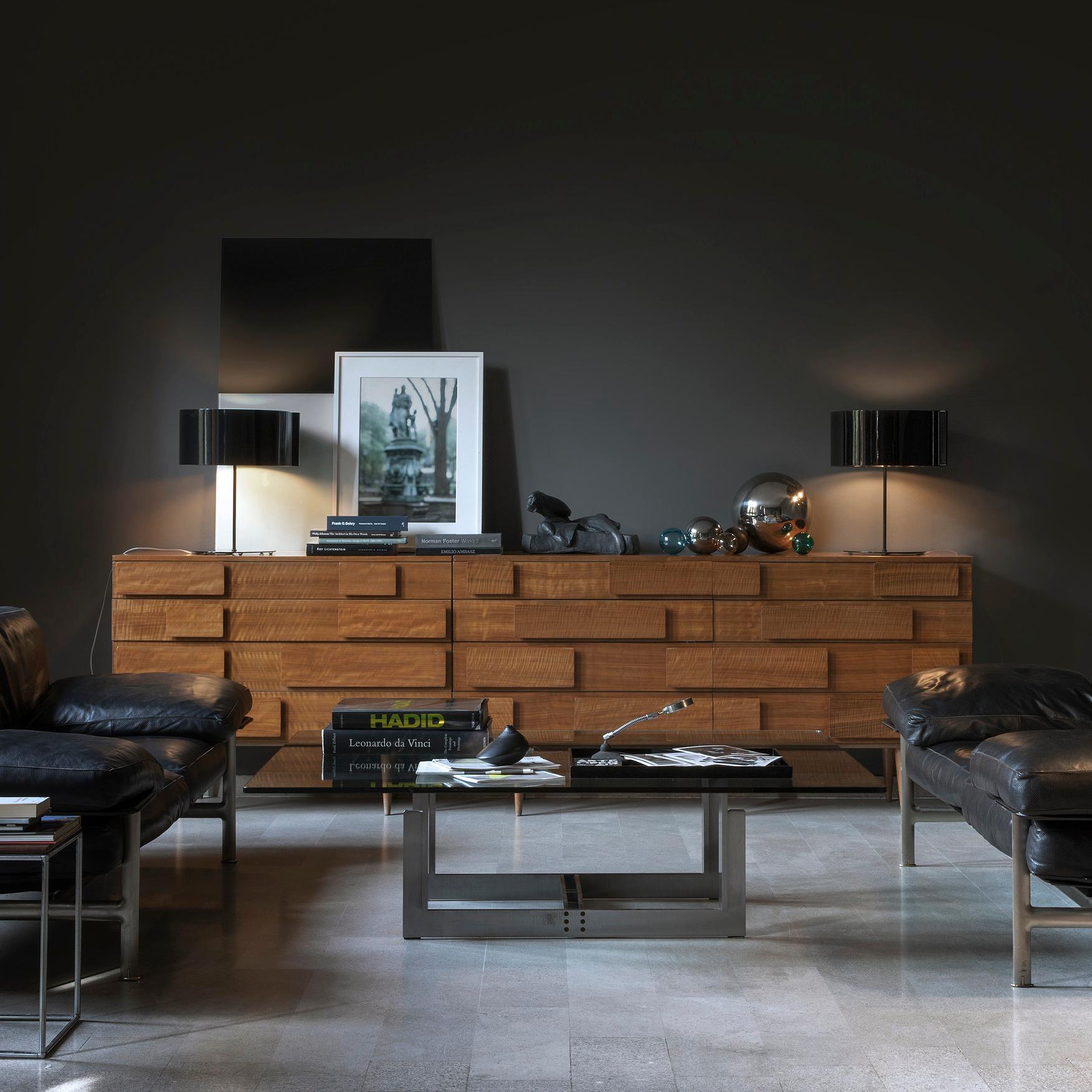 Table lamp 'Switch' designed by Nendo in 2007.
Table lamp giving direct and indirect light. Metal structure and reflector. On/off lighting by reflector’s rotation.
Manufactured by Oluce, Italy.

By means of the Switch lamp, the Japanese designer