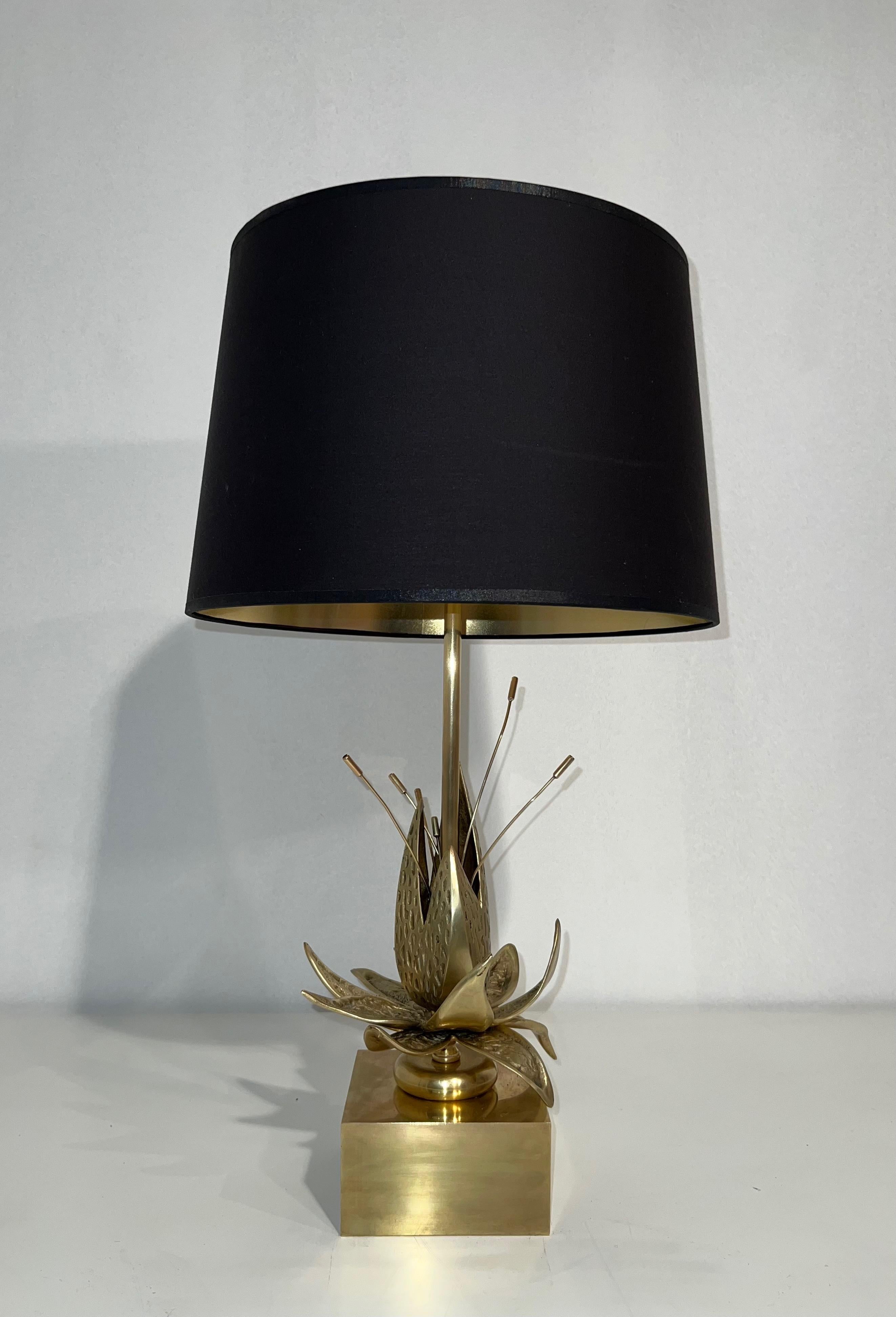 This beautiful nenuphar table lamp is made of bronze and brass. This is a French work attributed to Maison Charles. Circa 1970