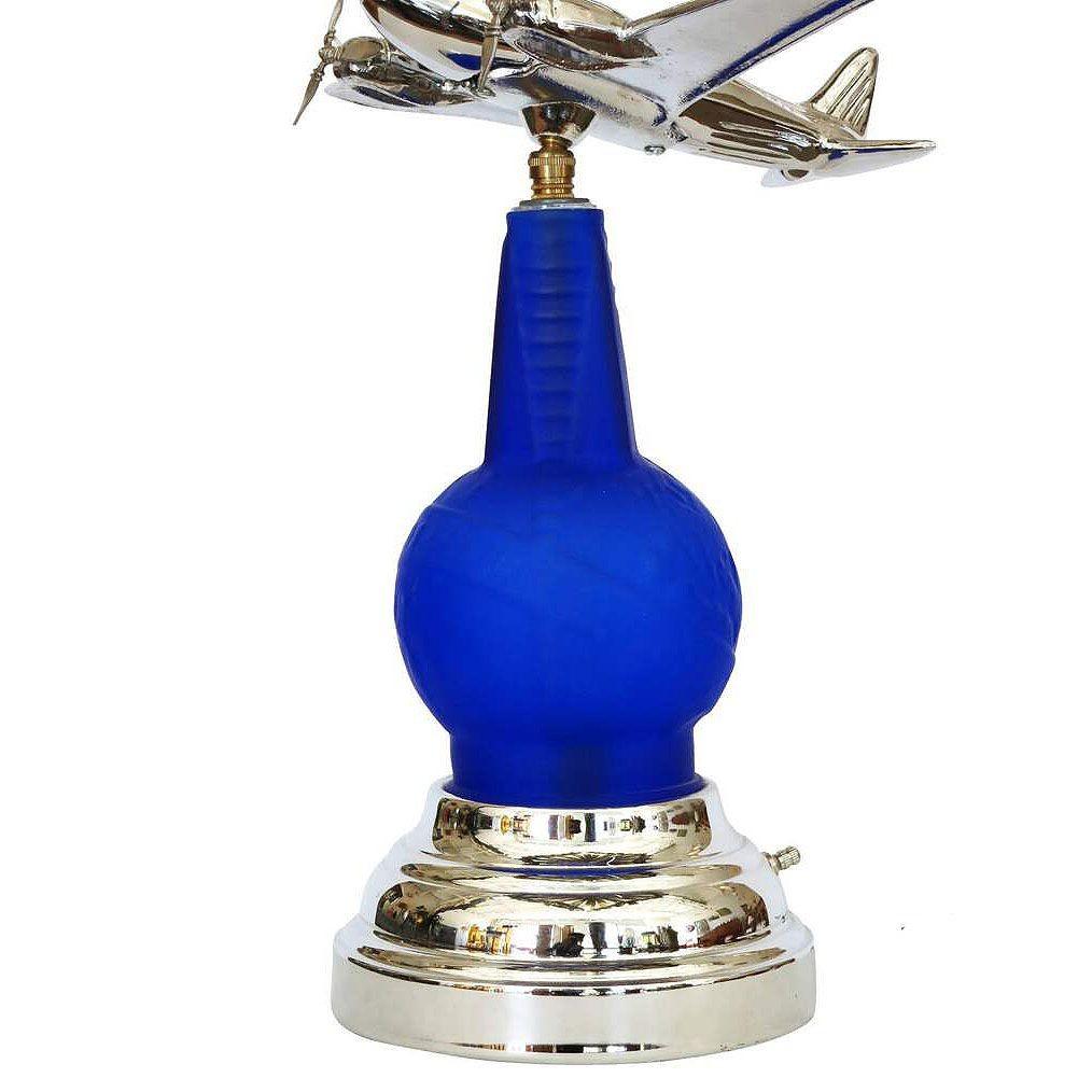 Reedition 1939 World's Fair Airplane Art Deco Lamp based on the DC-3 passenger plane and the 1939 New York World's Fair commemorative bottle designed by Rick Ramírez for Derico Lighting. The plane is similar to a DC-3 passenger plane; it has a